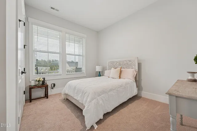 a view of a yard in front view of a house