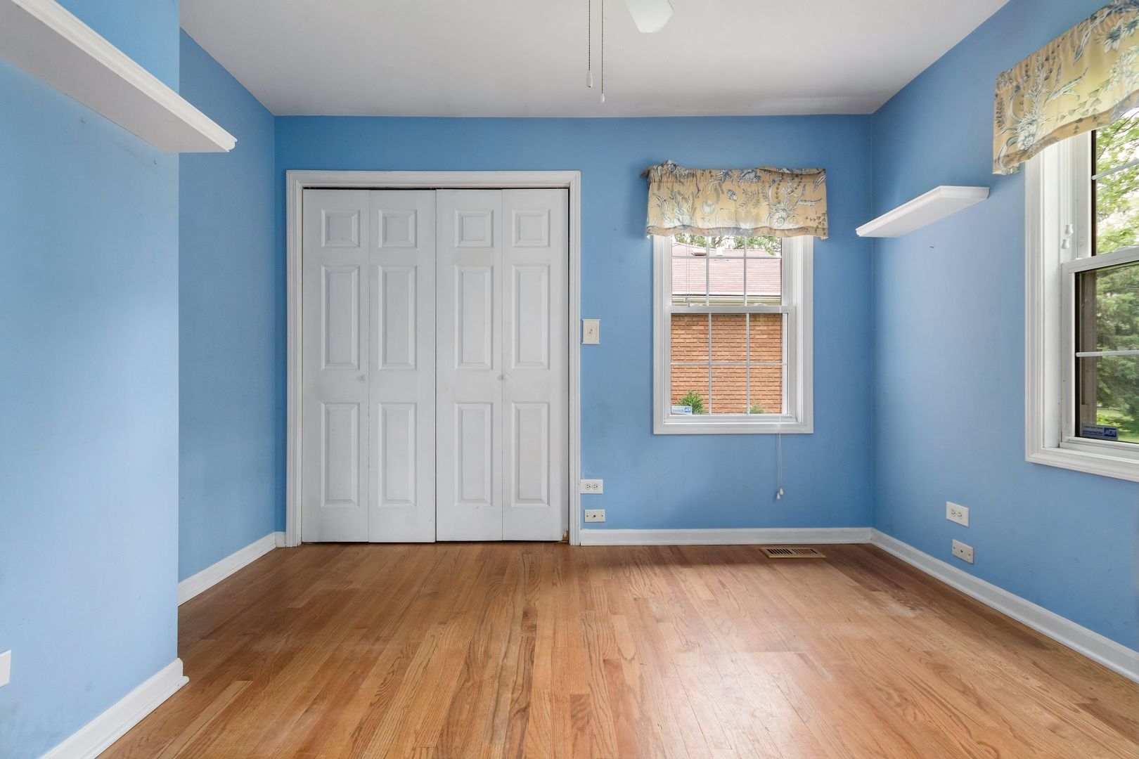 N659 Old Kirk Road West Chicago, IL 60185 - Photo 15 of 24 an empty room with wooden floor and windows