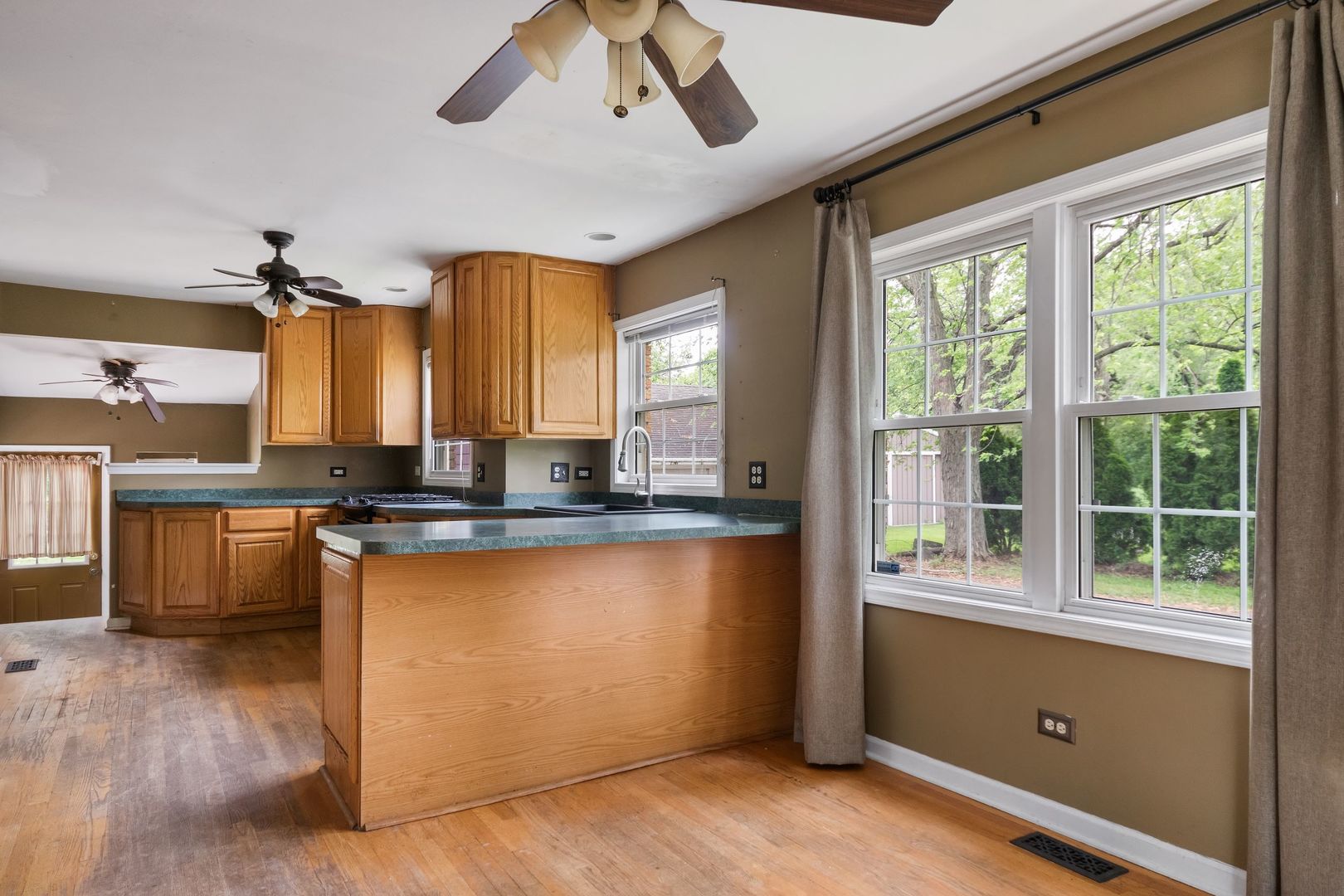 N659 Old Kirk Road West Chicago, IL 60185 - Photo 5 of 24 a kitchen with stainless steel appliances granite countertop a stove a sink and a refrigerator