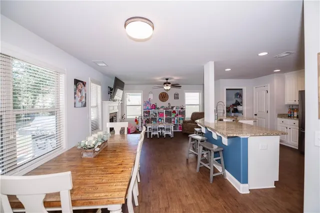 a view of a living room and dining room