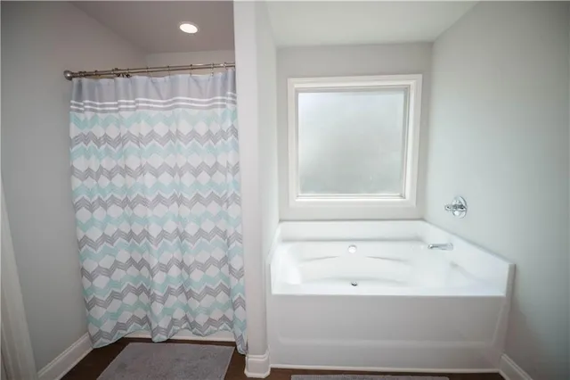 a bathroom with a bathtub