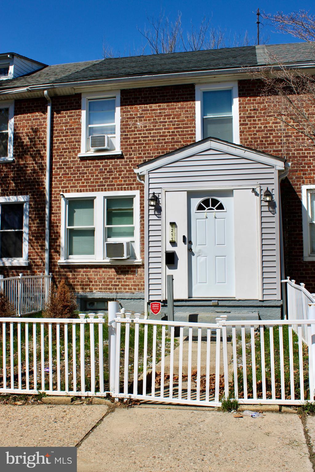 1211 South Octagon Road Camden, NJ 08104 - Photo 1 of 18 a front view of a house with a glass door