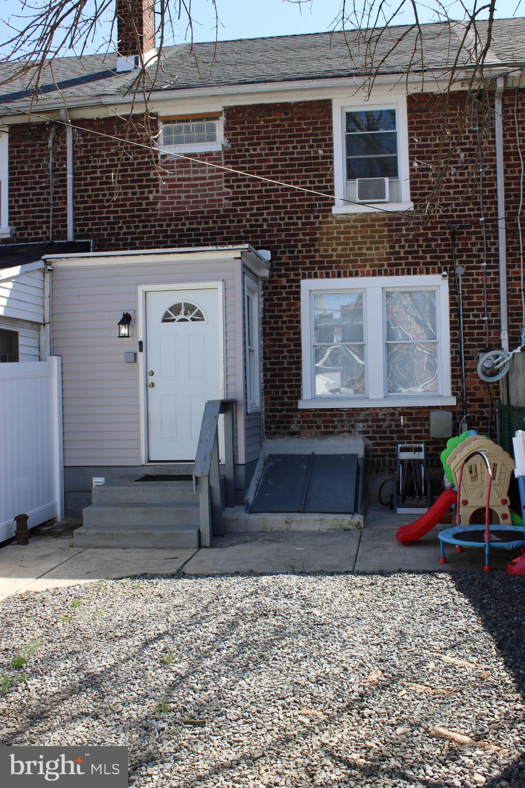 1211 South Octagon Road Camden, NJ 08104 - Photo 17 of 18 a front view of a house with patio