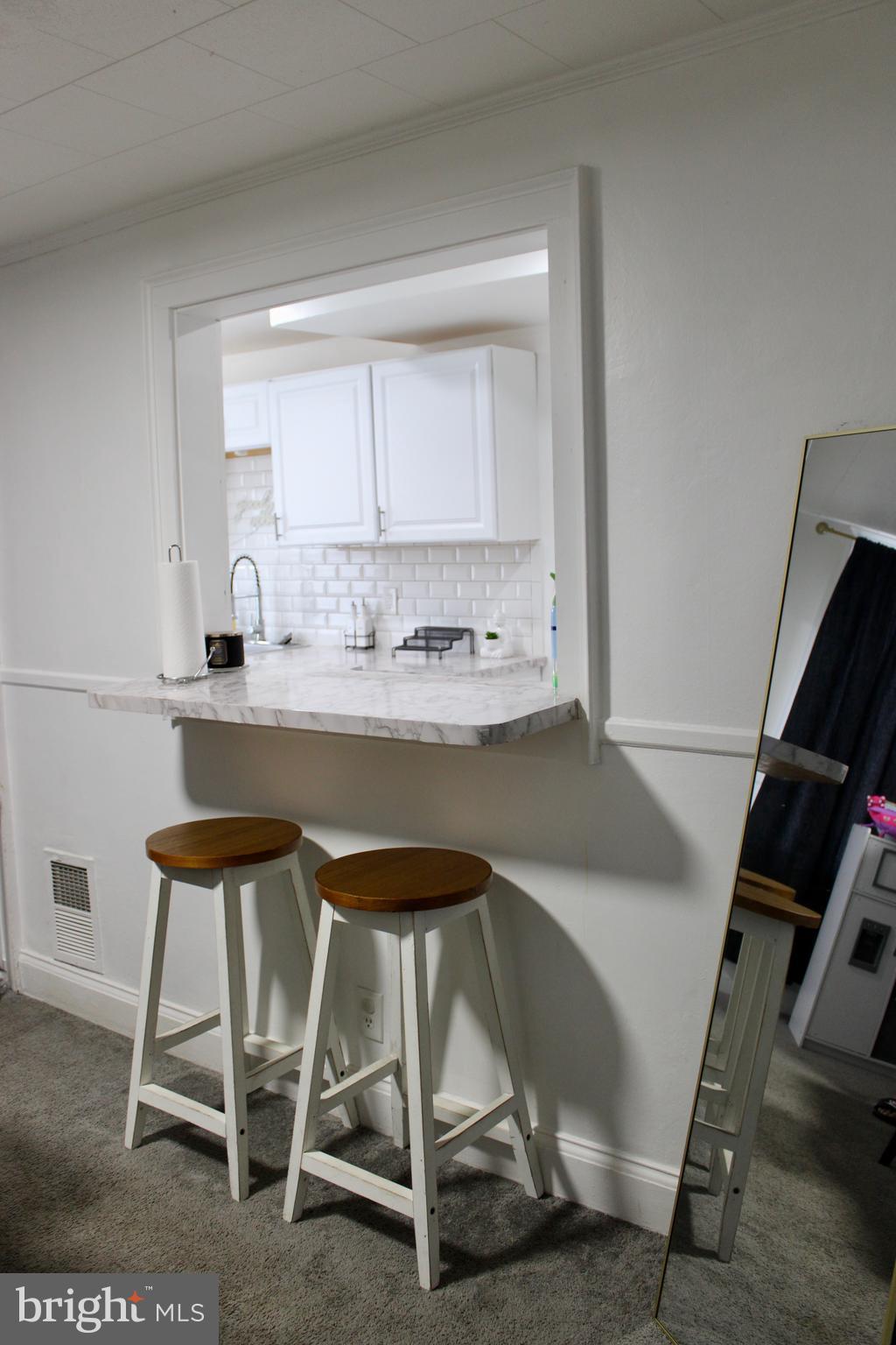 1211 South Octagon Road Camden, NJ 08104 - Photo 6 of 18 a dining room with a table and chairs