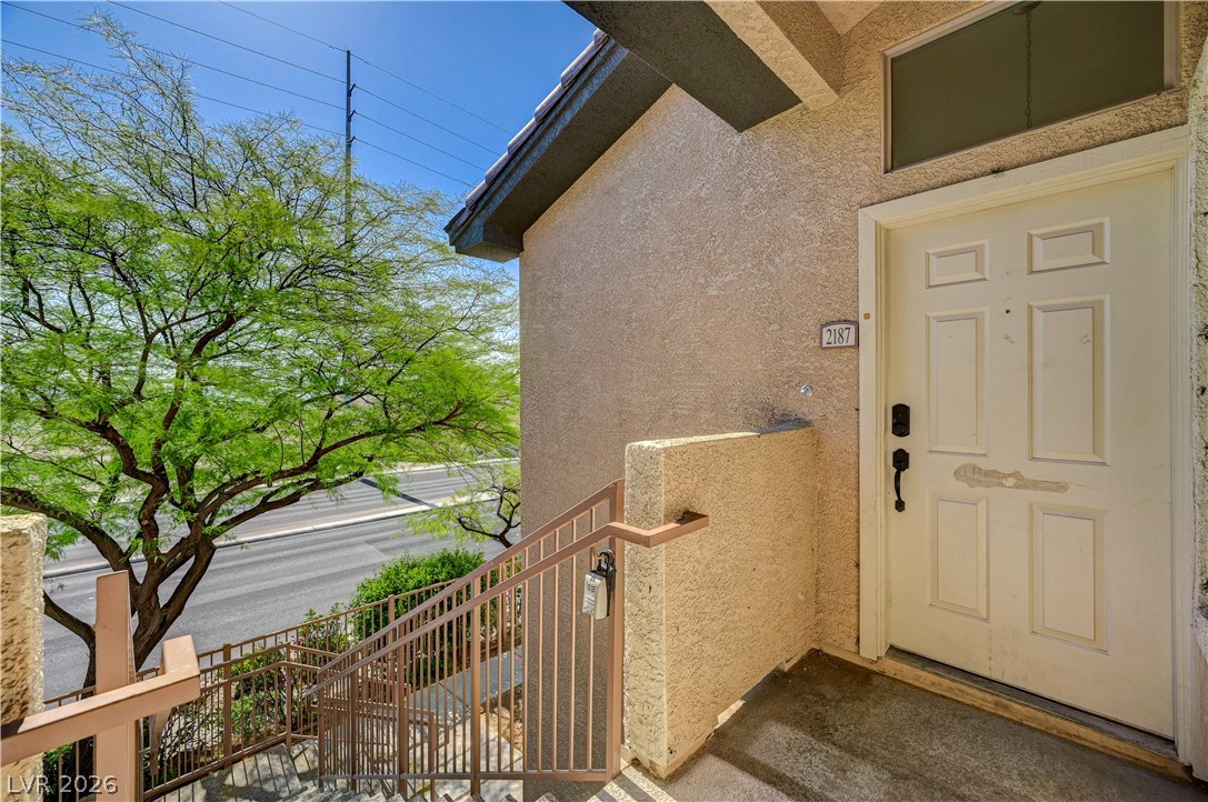 8985 South Durango Drive, Unit 2187 Las Vegas, NV 89113 - Photo 11 of 73 A well-maintained stucco facade welcomes you to this inviting property.