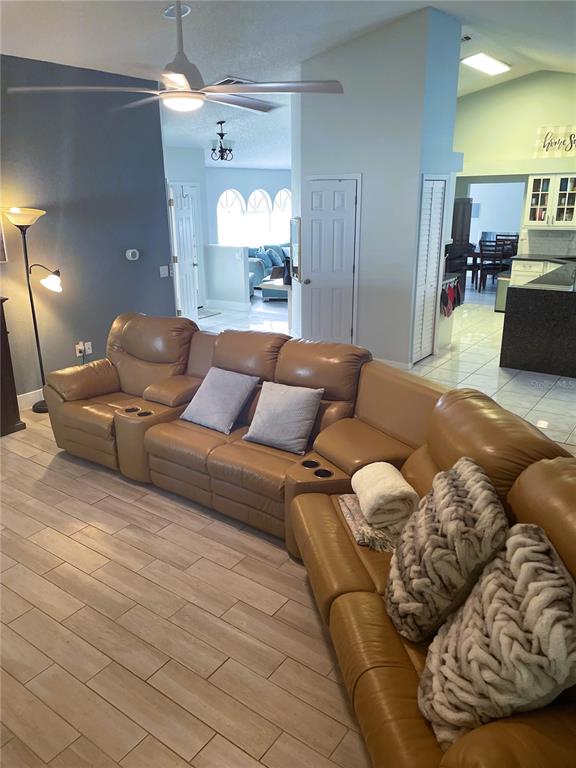 2571 Running Oak Court Spring Hill, FL 34608 - Photo 15 of 37 a living room with furniture and a couch