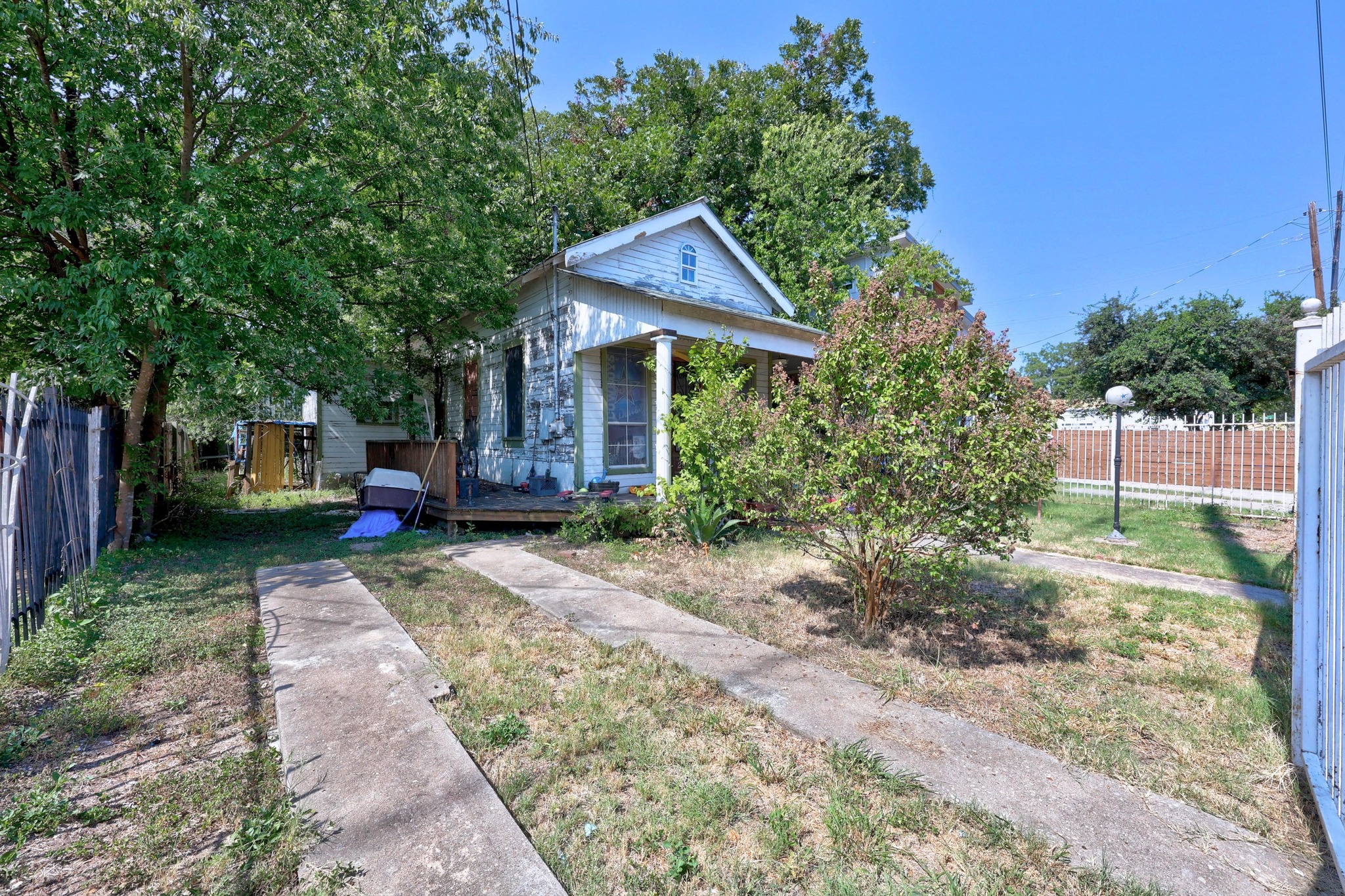 2907 East 5th Street Austin, TX 78702 - Photo 17 of 22 a view of a house with a yard