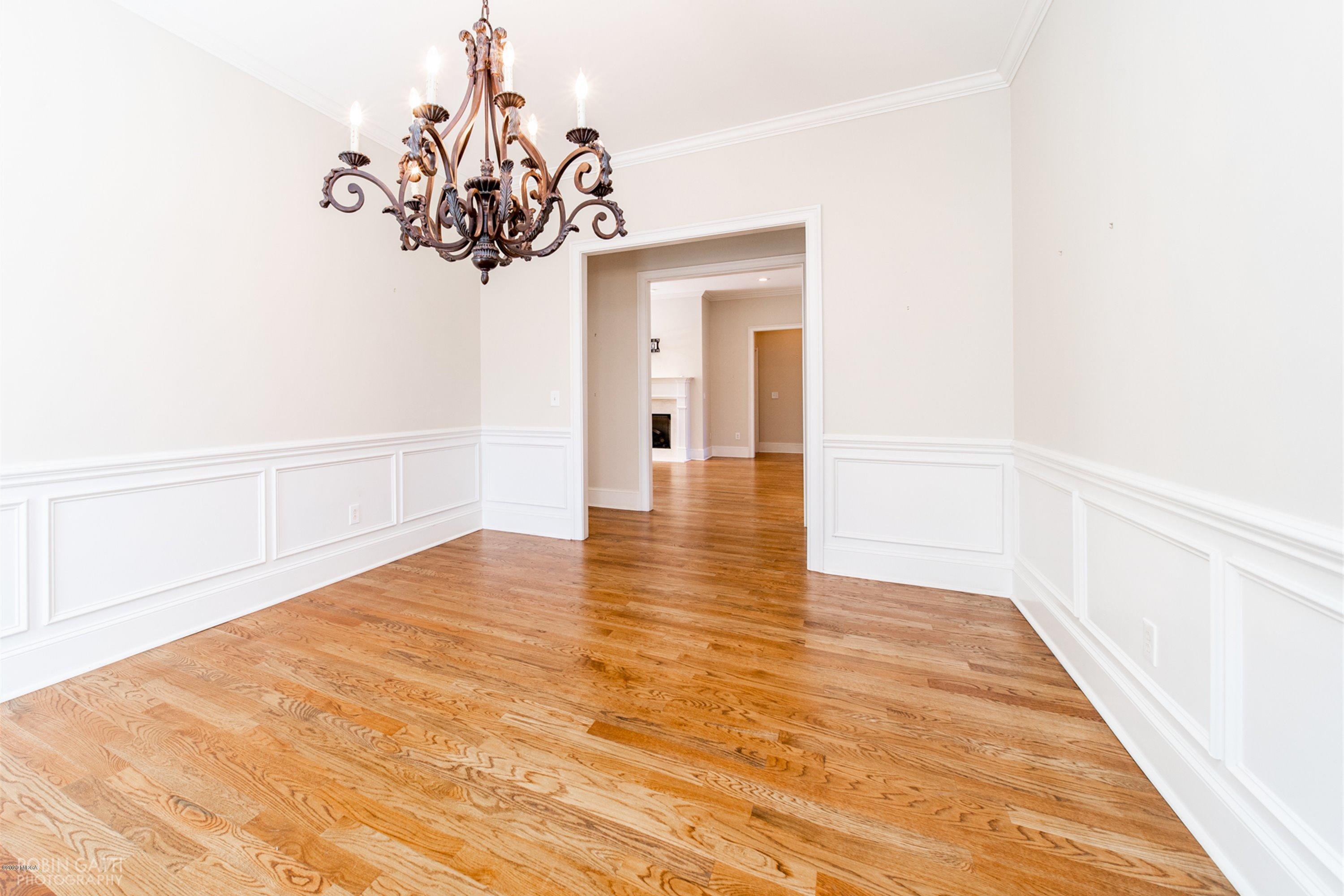 5022 Tucker Ridge Macon, GA 31210 - Photo 11 of 38 a view of a hallway with a chandelier