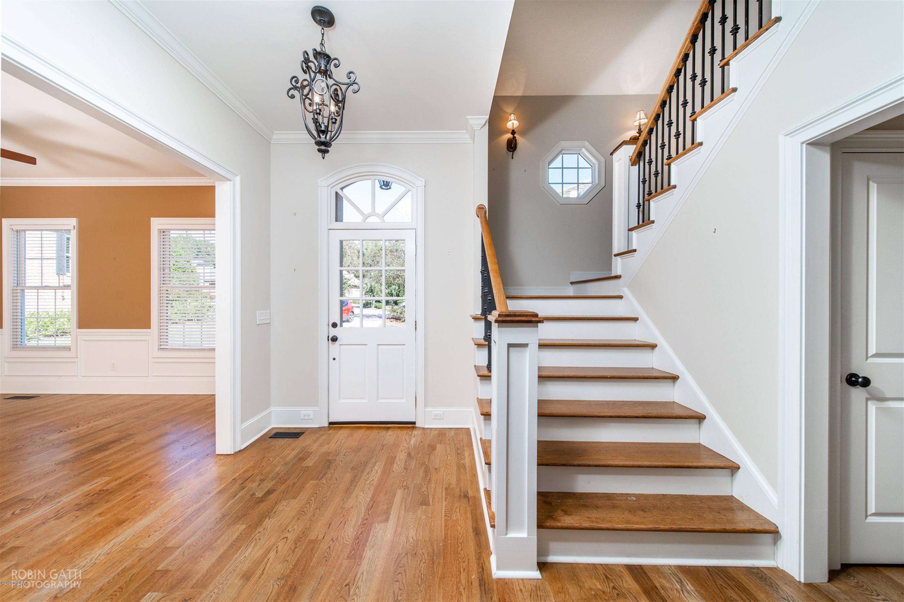 5022 Tucker Ridge Macon, GA 31210 - Photo 14 of 38 a view of a hallway with wooden floor and entryway