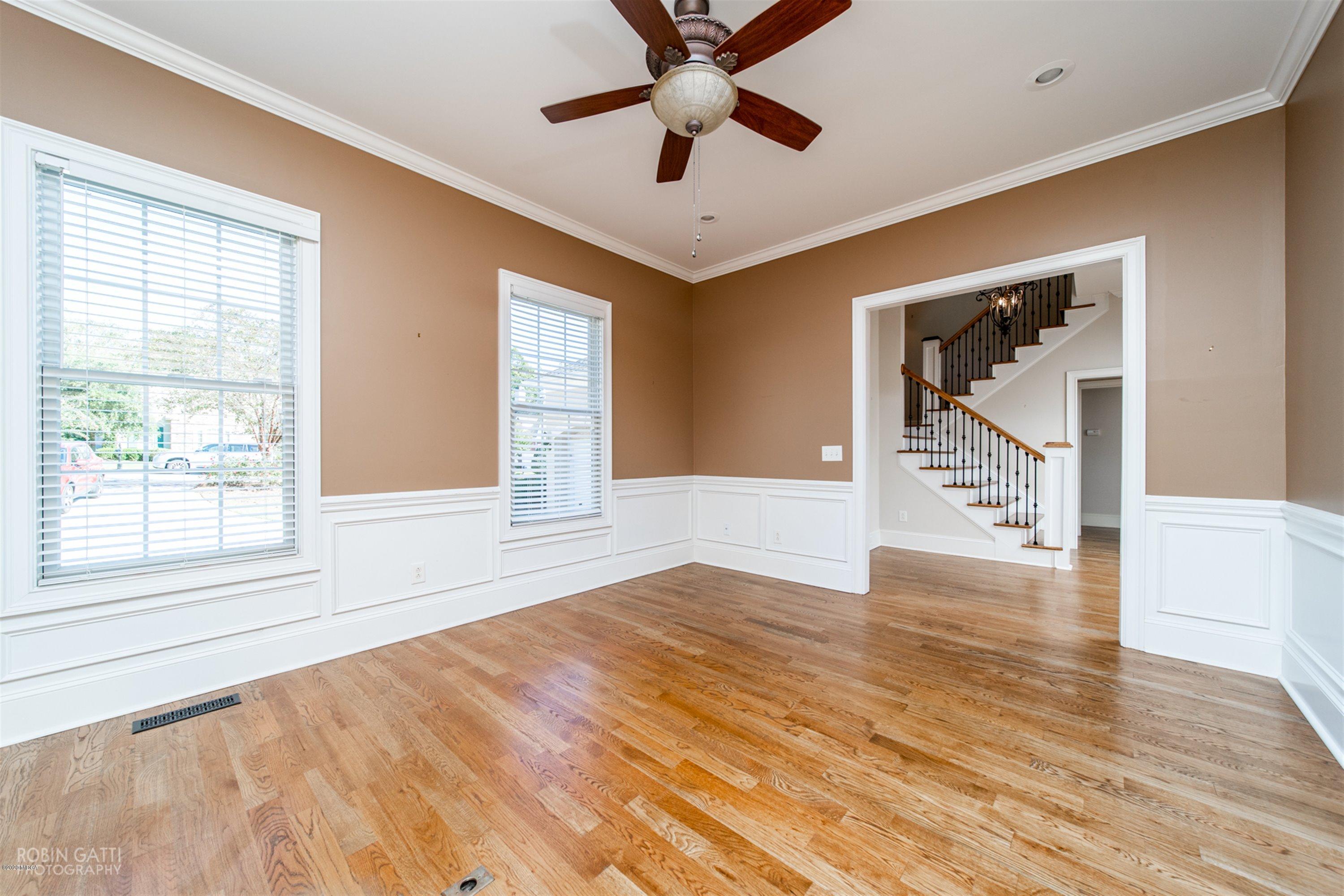 5022 Tucker Ridge Macon, GA 31210 - Photo 16 of 38 a view of an empty room with window and wooden floor