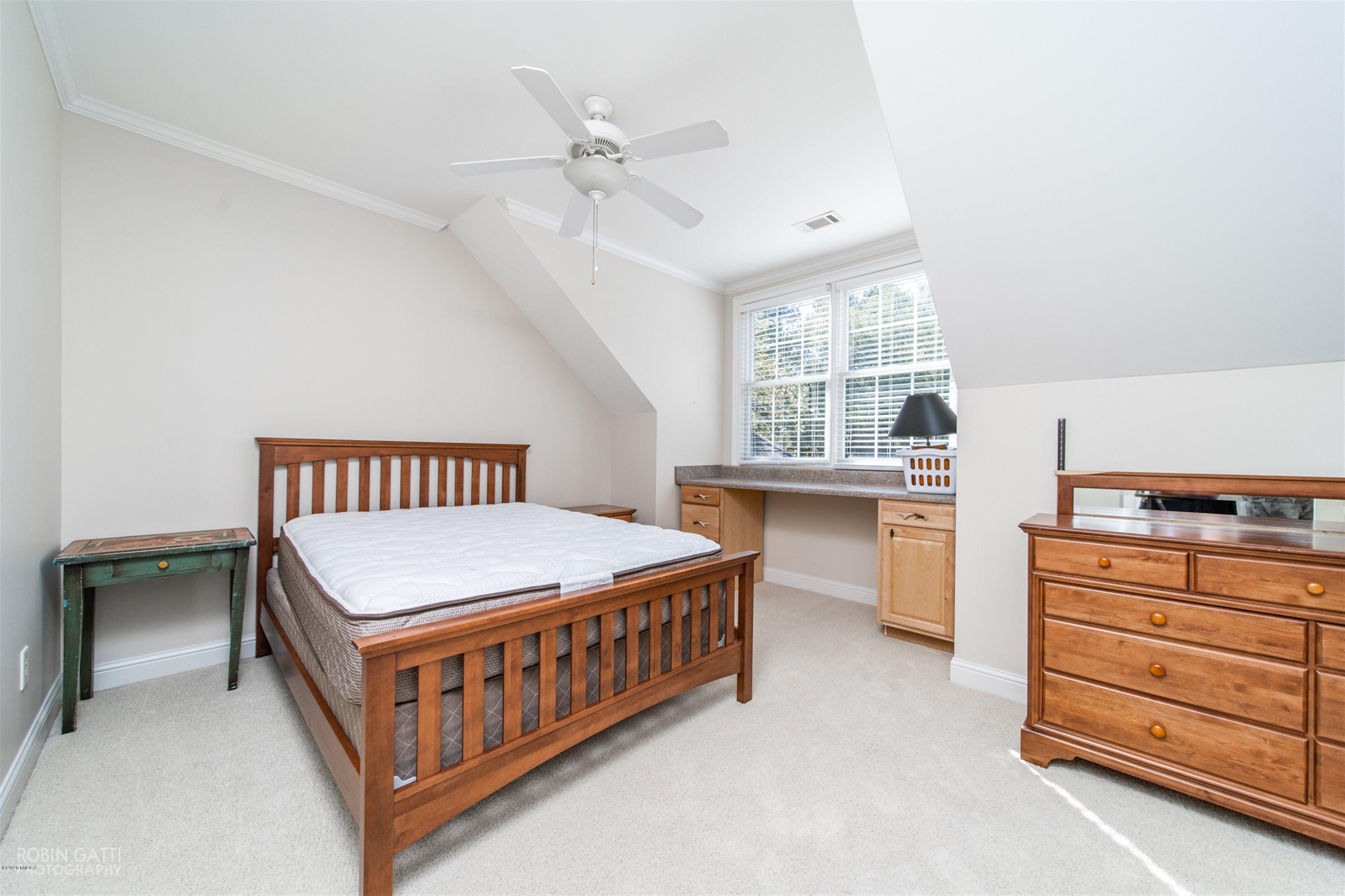 5022 Tucker Ridge Macon, GA 31210 - Photo 24 of 38 a bedroom with a bed and a window
