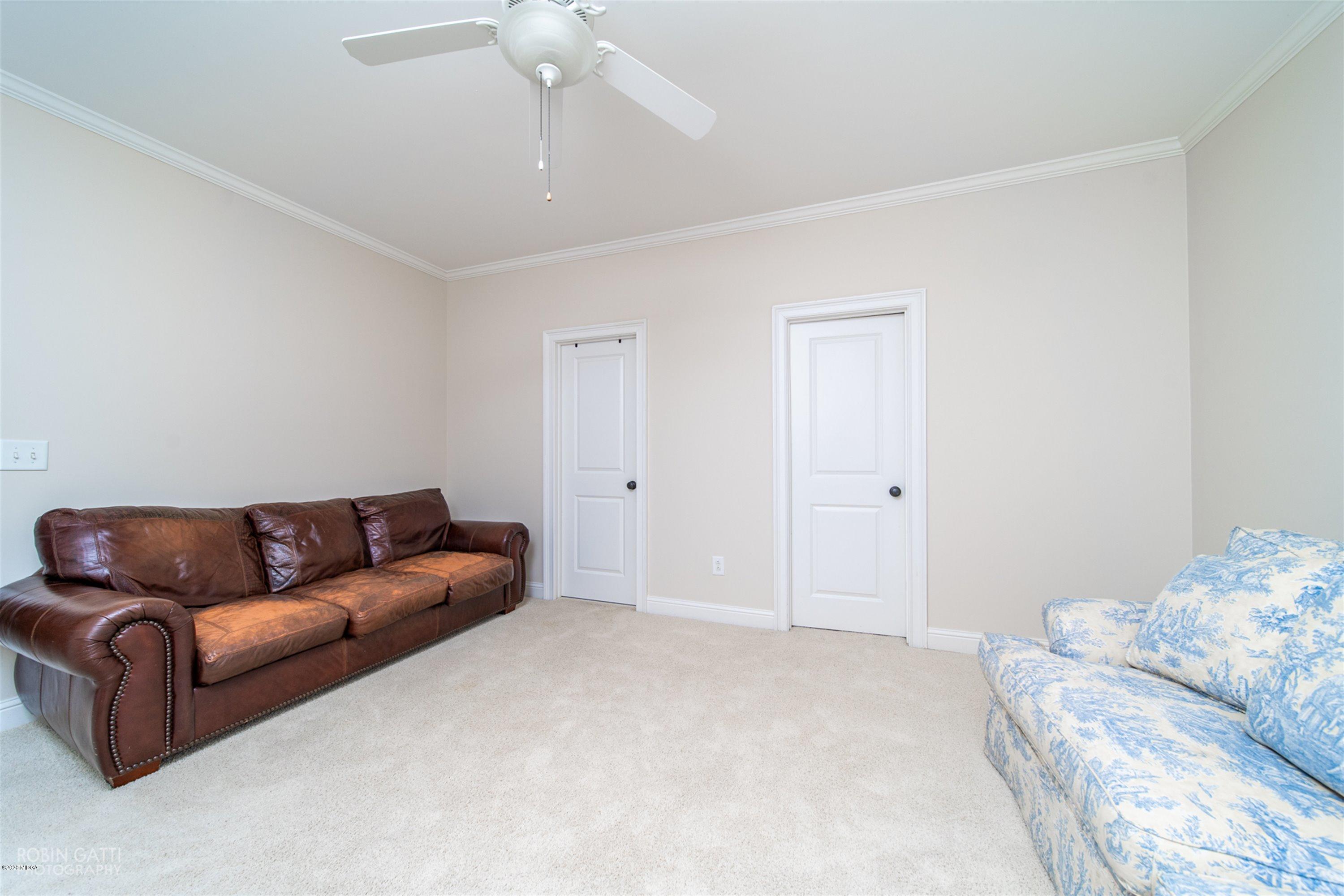 5022 Tucker Ridge Macon, GA 31210 - Photo 28 of 38 a living room with furniture and a couch