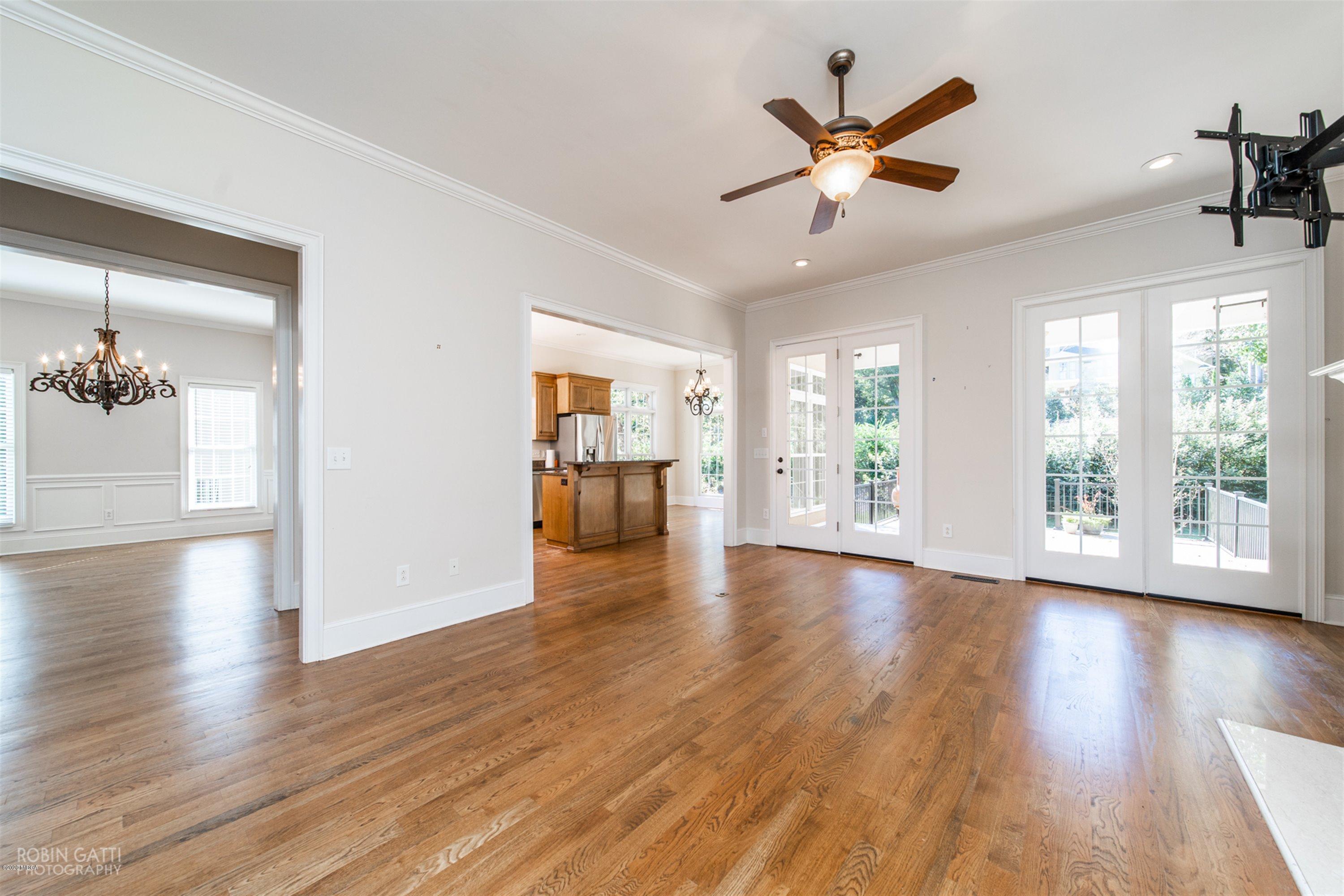 5022 Tucker Ridge Macon, GA 31210 - Photo 4 of 38 a view of an empty room with wooden floor and a window
