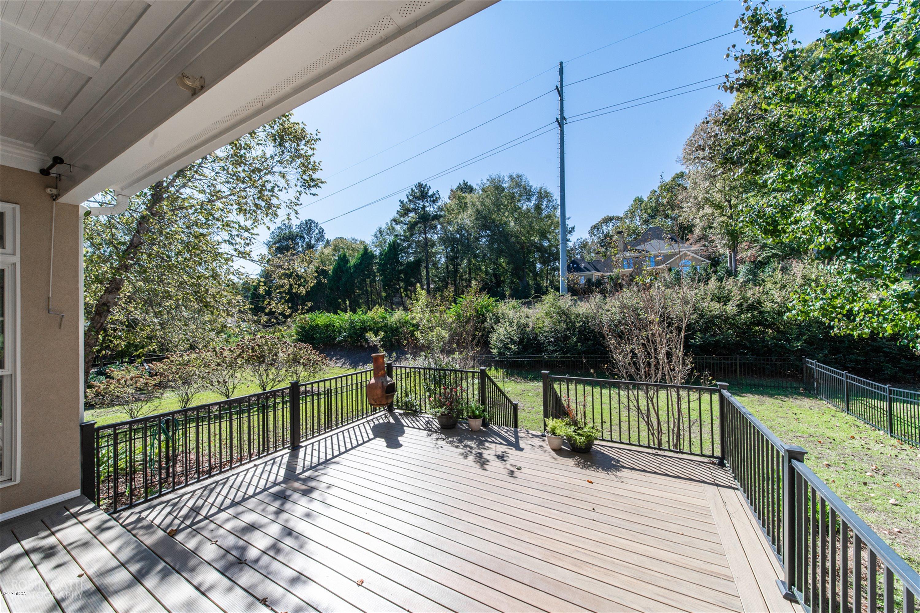 5022 Tucker Ridge Macon, GA 31210 - Photo 33 of 38 a view of a balcony with wooden floor