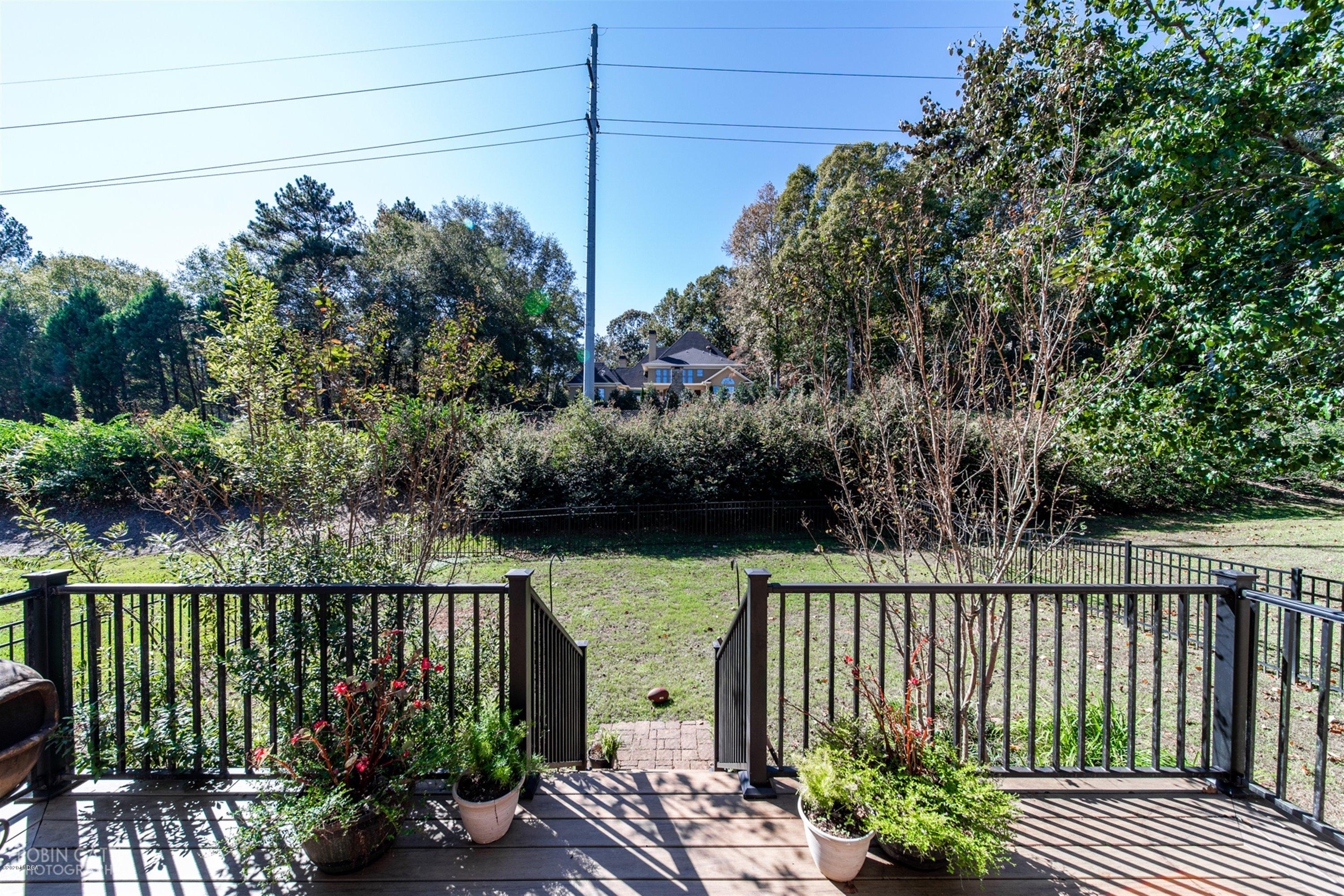 5022 Tucker Ridge Macon, GA 31210 - Photo 34 of 38 a balcony with wooden floor