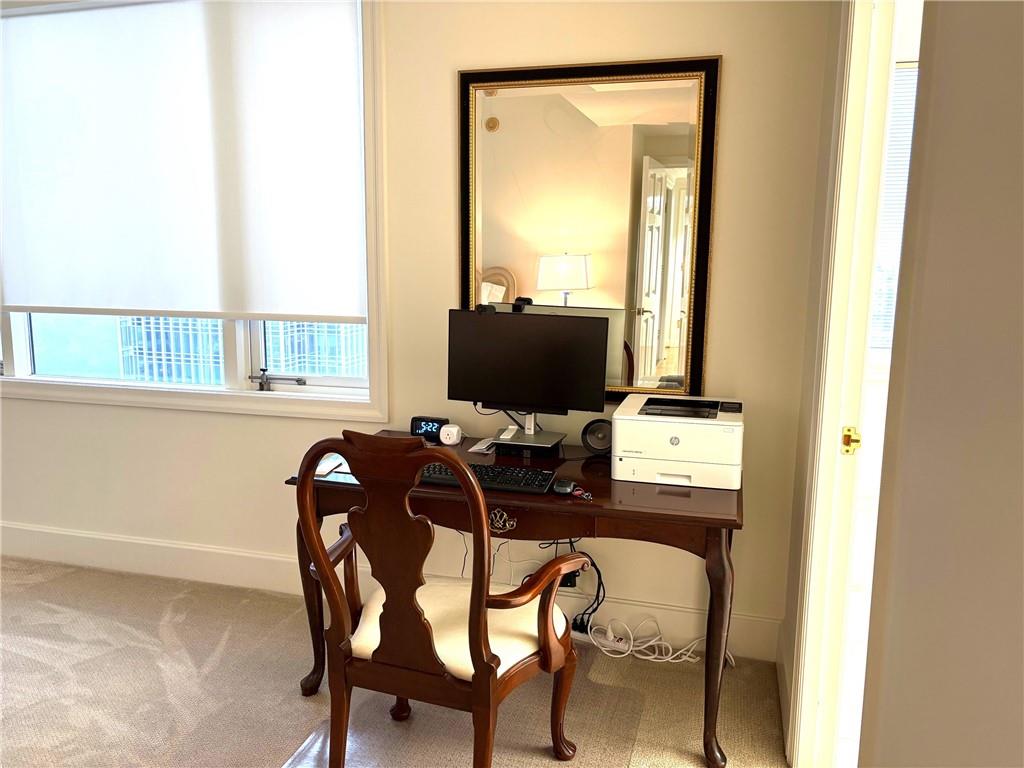 75 14th Street Northeast, Unit 3650 Atlanta, GA 30309 - Photo 15 of 25 a view of a workspace with furniture