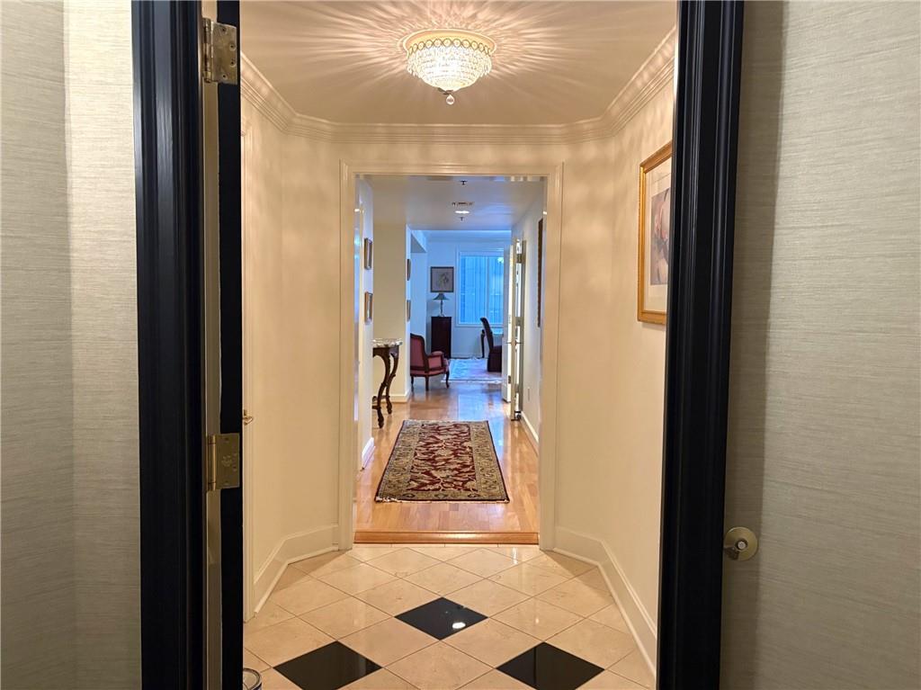 75 14th Street Northeast, Unit 3650 Atlanta, GA 30309 - Photo 2 of 25 a view of a hallway to a livingroom with furniture