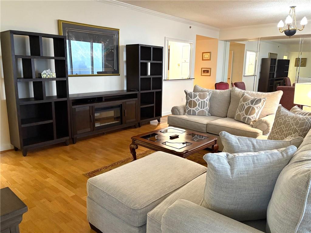 75 14th Street Northeast, Unit 3650 Atlanta, GA 30309 - Photo 7 of 25 a living room with furniture