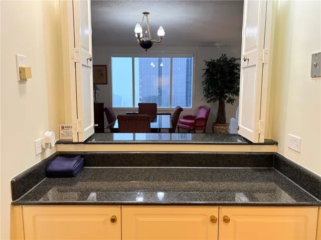 a bathroom with sink and mirror