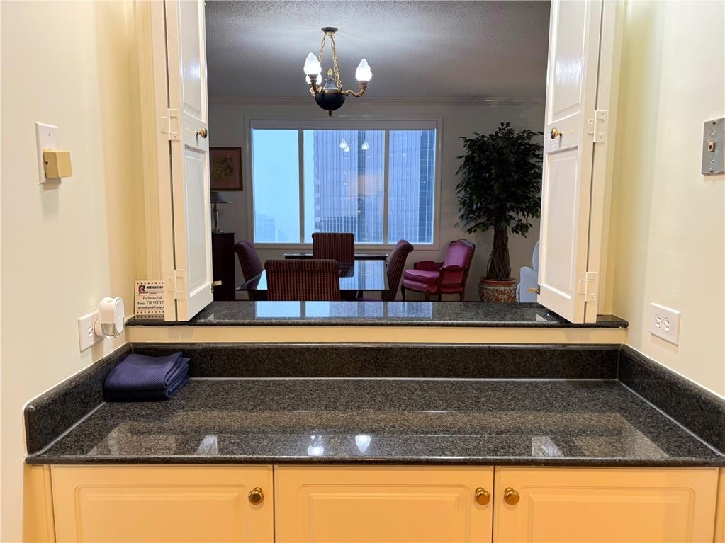 75 14th Street Northeast, Unit 3650 Atlanta, GA 30309 - Photo 8 of 25 a bathroom with sink and mirror