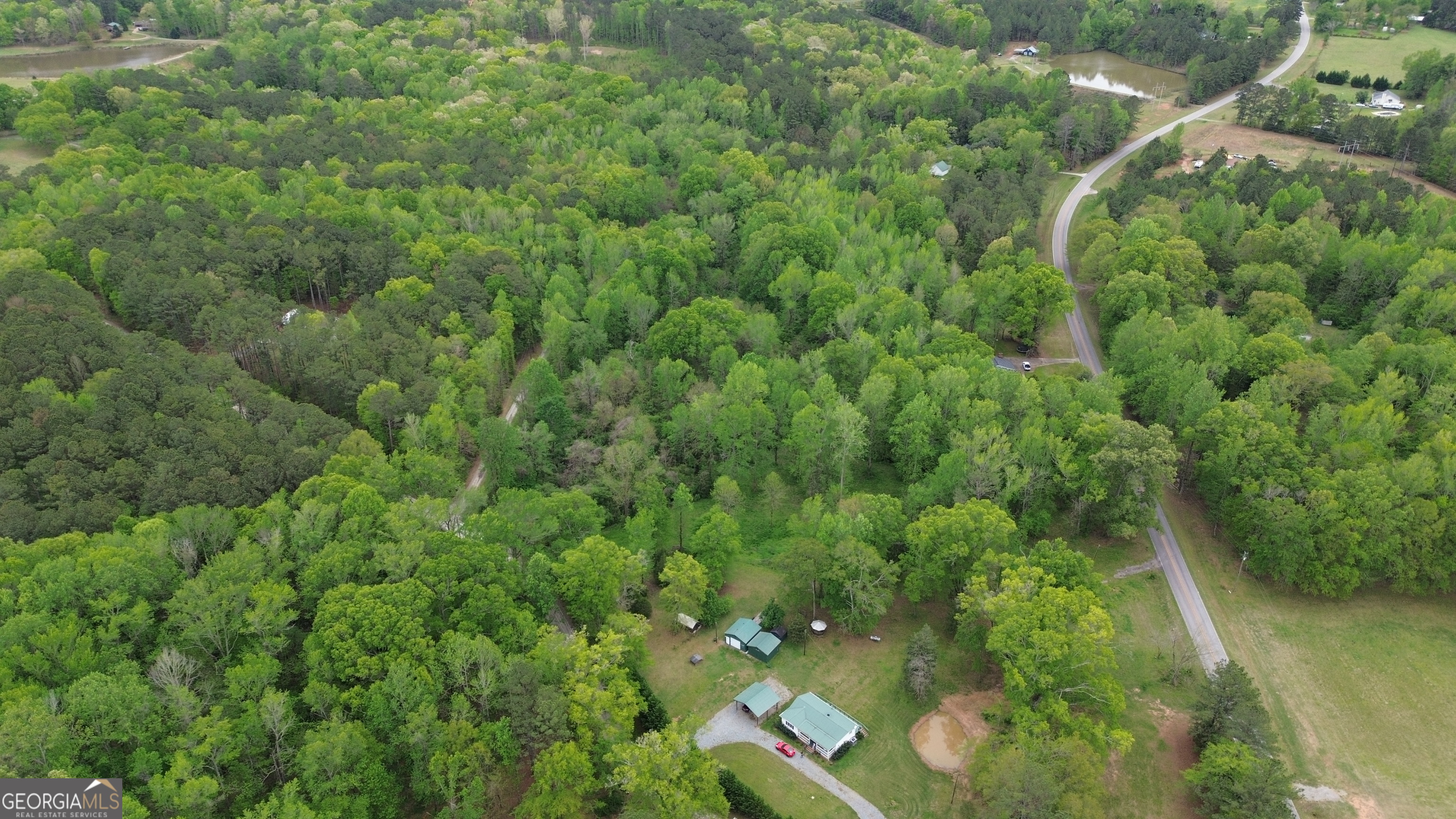 969 Flowers Road Molena, GA 30258 - Photo 13 of 16 a view of a garden