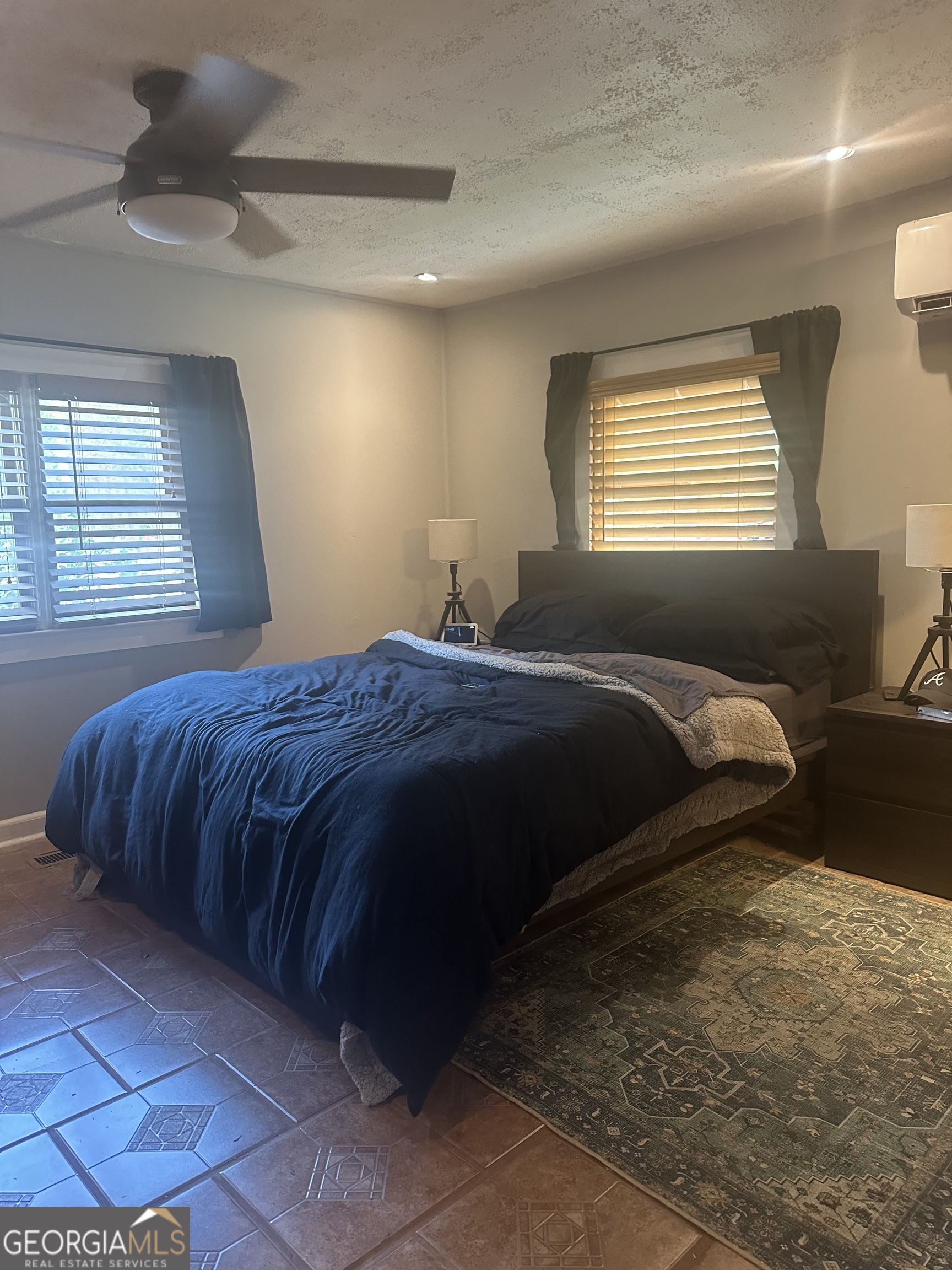 969 Flowers Road Molena, GA 30258 - Photo 15 of 16 a bedroom with a bed and window
