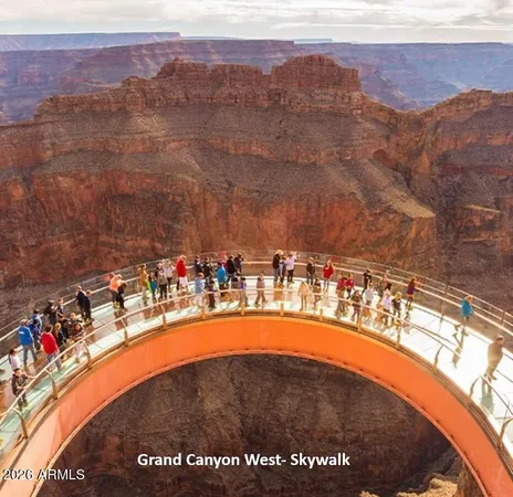 a view of a street with mountains in the background