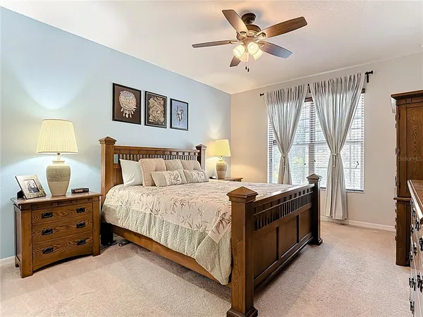 a view of a house with backyard and porch