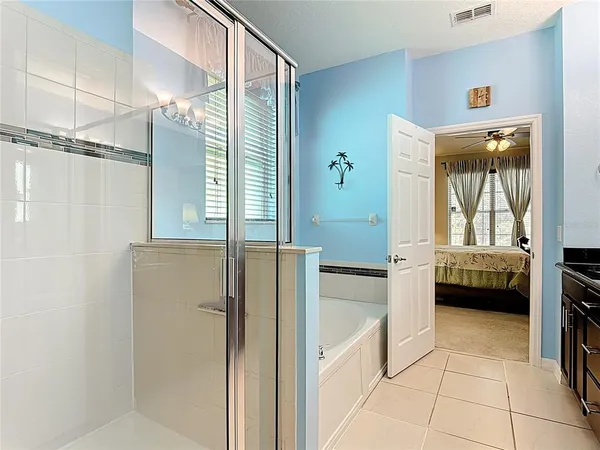 an aerial view of house with a yard