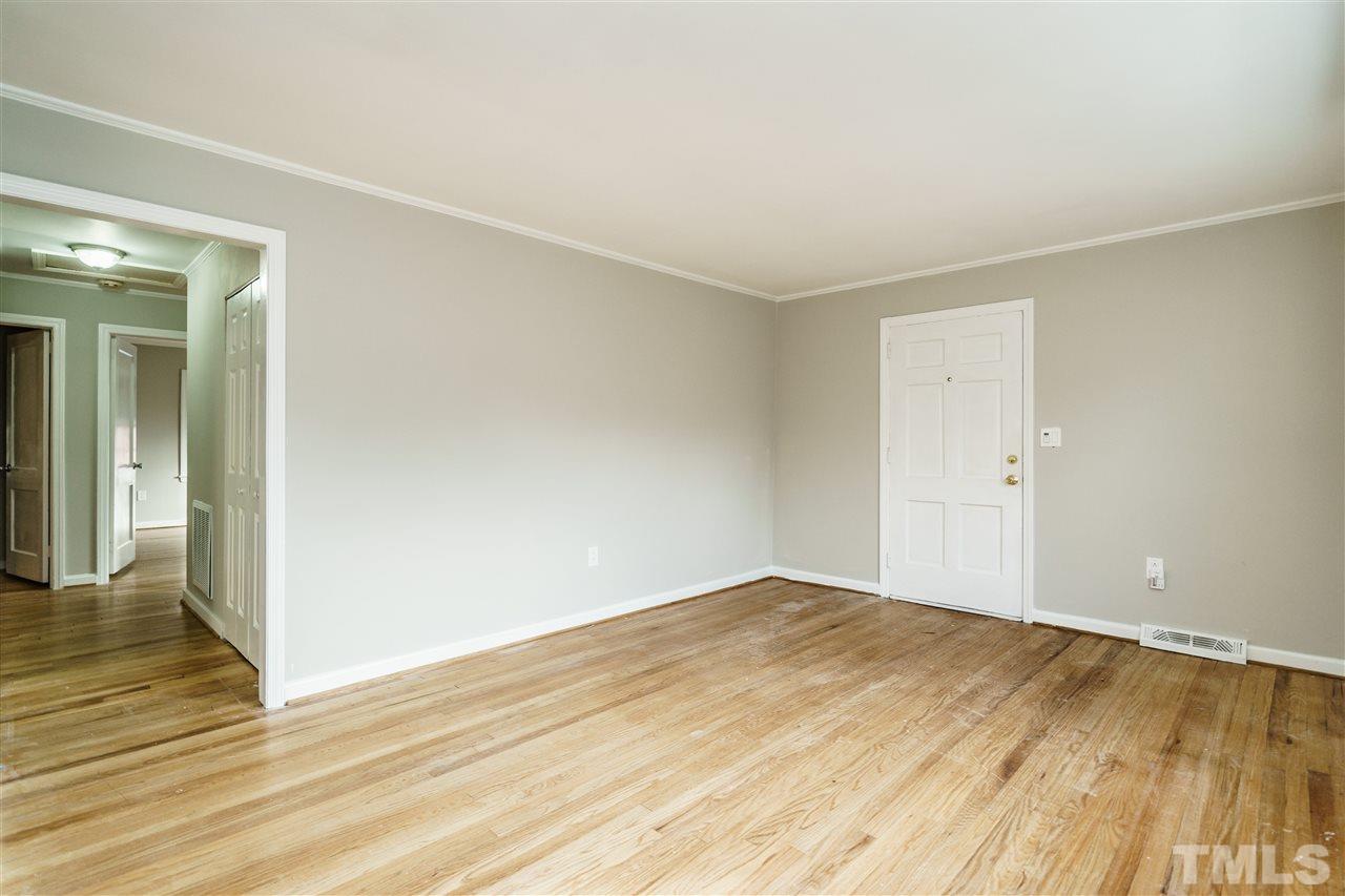 2732 Layden Street Raleigh, NC 27603 - Photo 3 of 19 a view of empty room with wooden floor