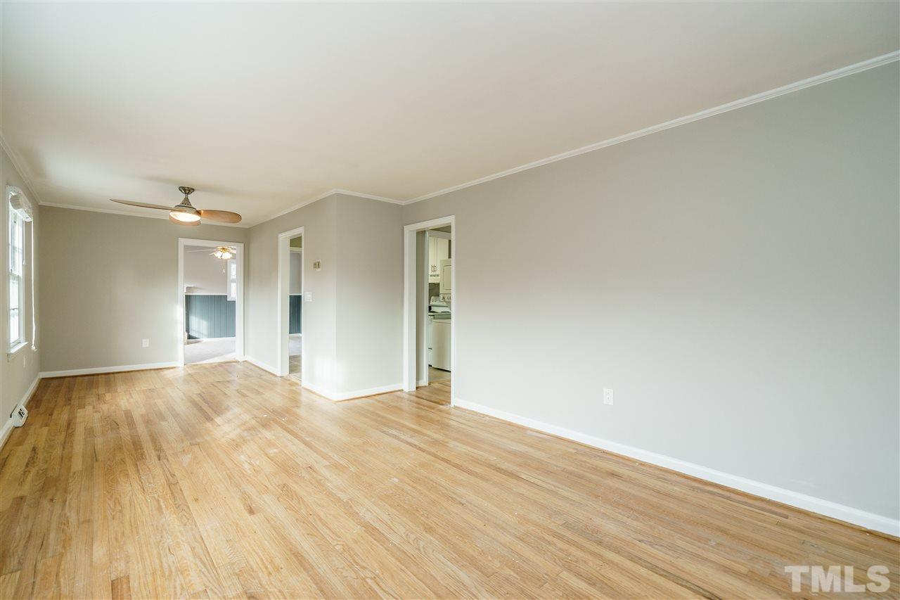 2732 Layden Street Raleigh, NC 27603 - Photo 5 of 19 a view of an empty room and wooden floor