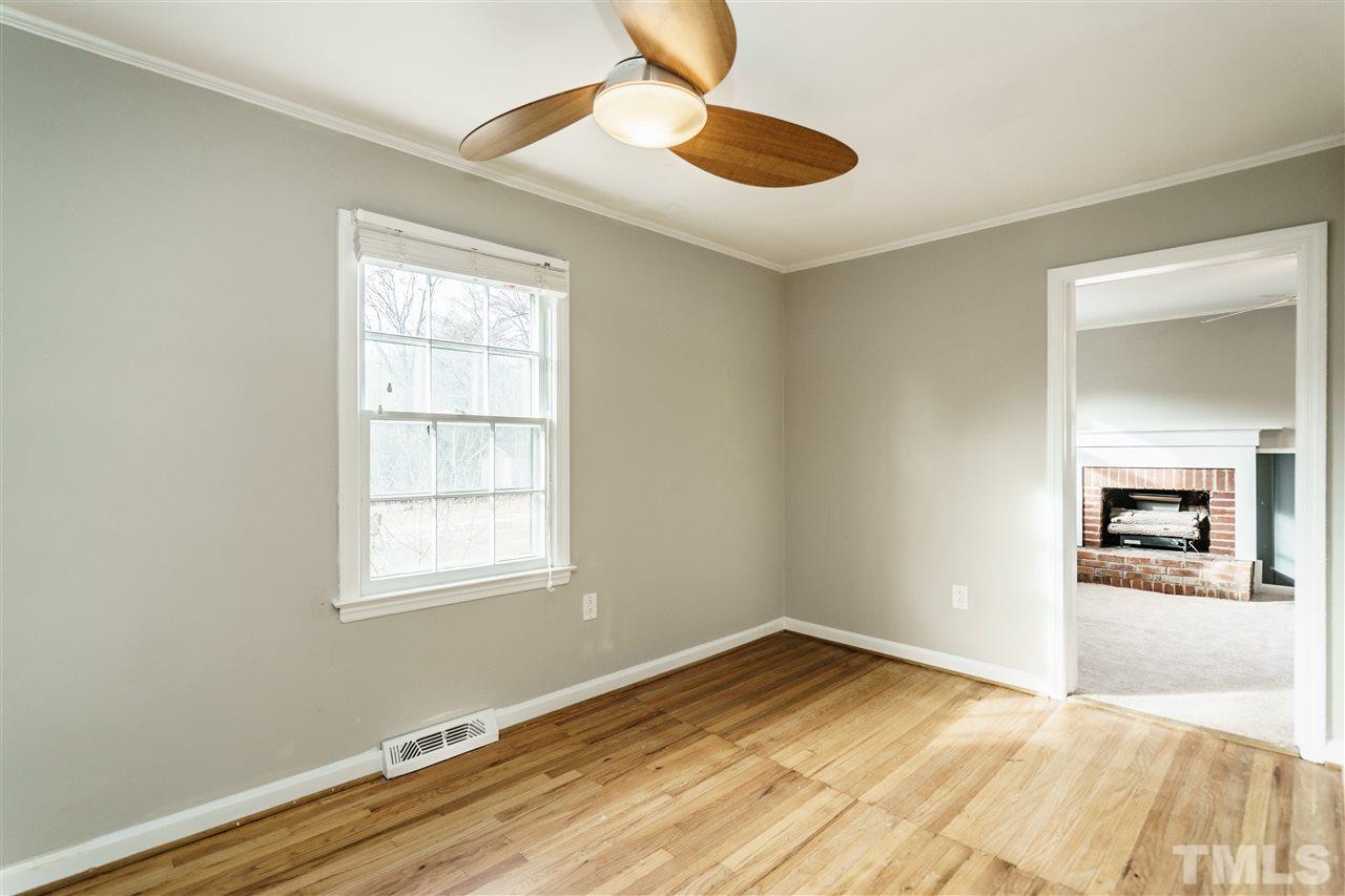 2732 Layden Street Raleigh, NC 27603 - Photo 6 of 19 a view of empty room with wooden floor