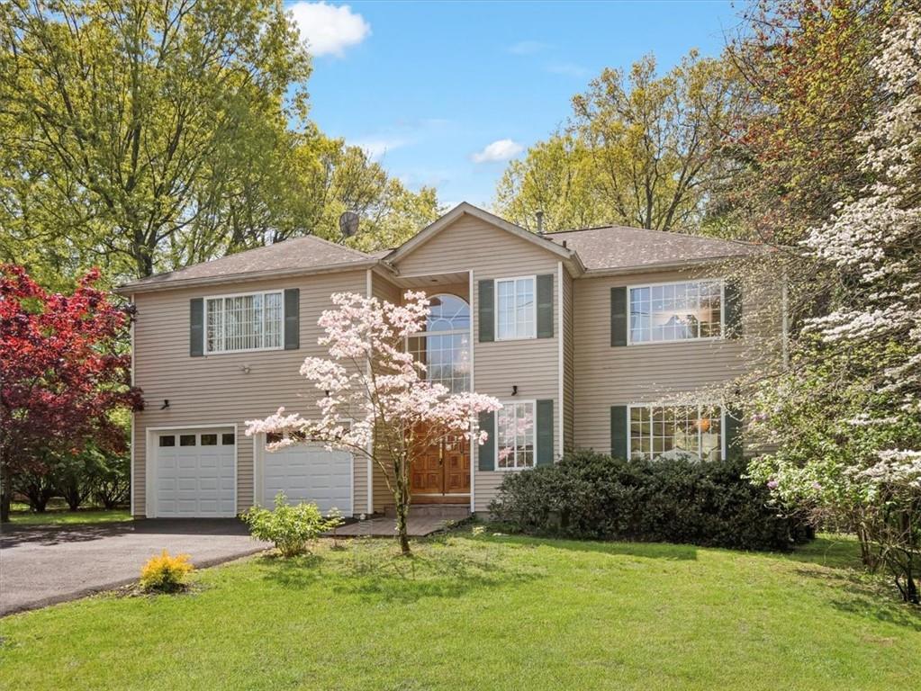 67 Phillips Hill Road New City, NY 10956 - Photo 1 of 1 a front view of a house with a yard