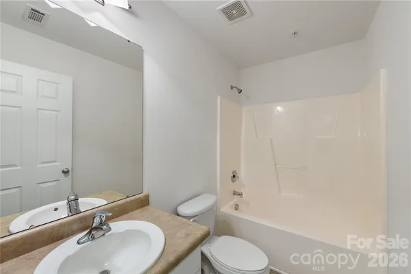a view of a room with an empty space