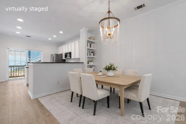 a view of a dining room with furniture