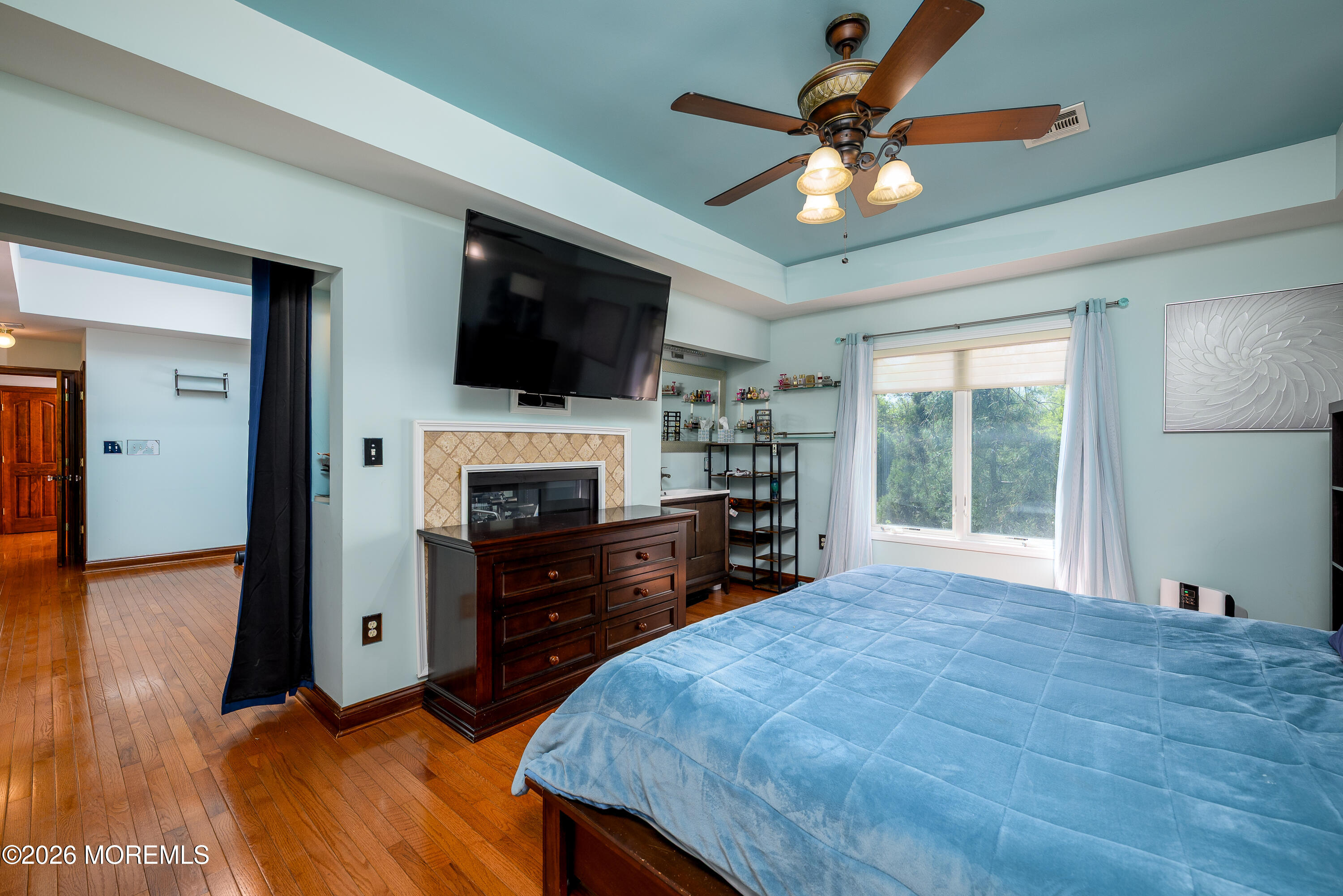 60 Partners Lane Freehold, NJ 07728 - Photo 21 of 56 a bed room with furniture and a flat screen tv