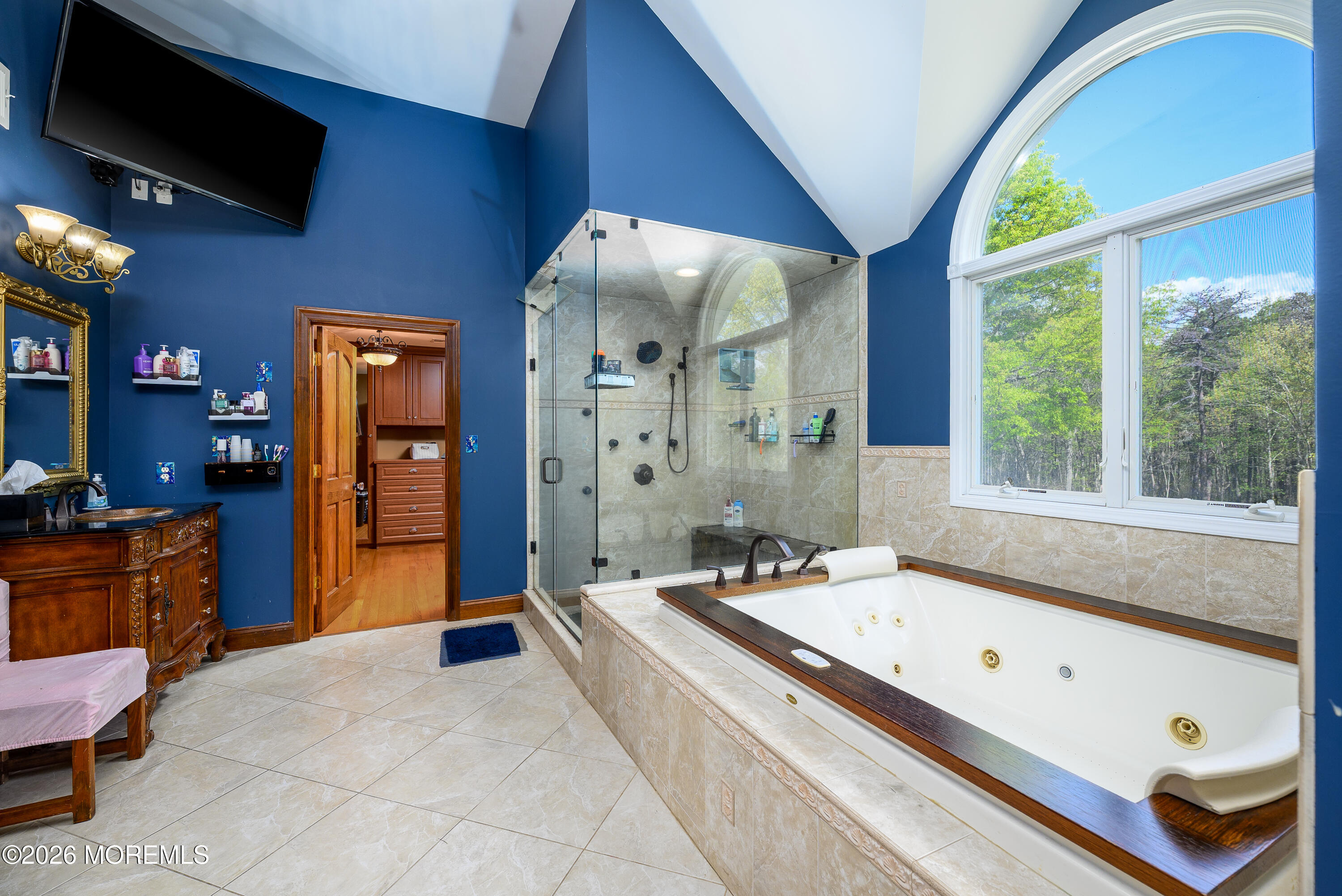 60 Partners Lane Freehold, NJ 07728 - Photo 22 of 56 a spacious bathroom with a granite countertop tub sink and mirror