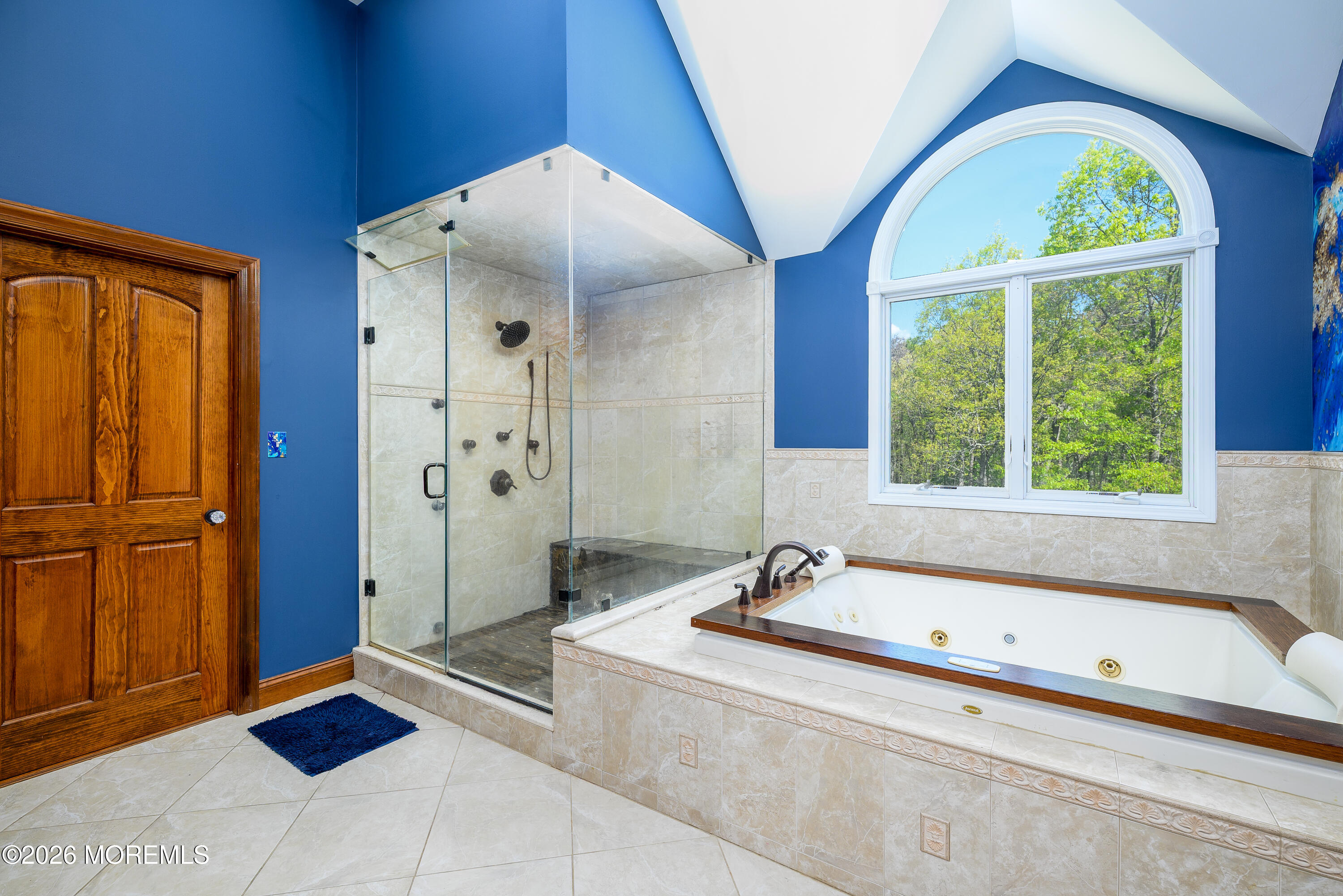 60 Partners Lane Freehold, NJ 07728 - Photo 23 of 56 a bathroom with a tub a sink and a large window