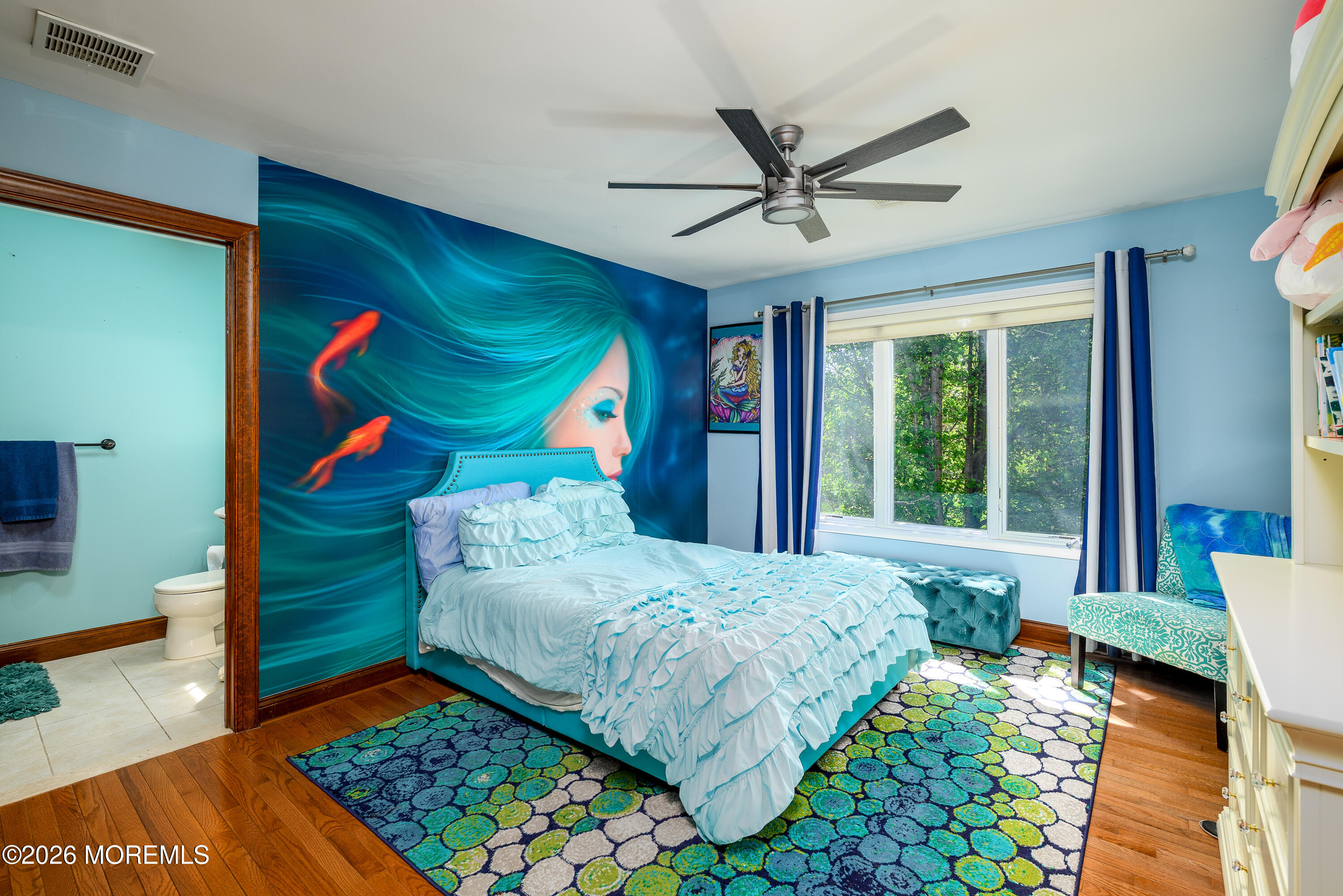 60 Partners Lane Freehold, NJ 07728 - Photo 28 of 56 a bedroom with a bed and a painting on the wall
