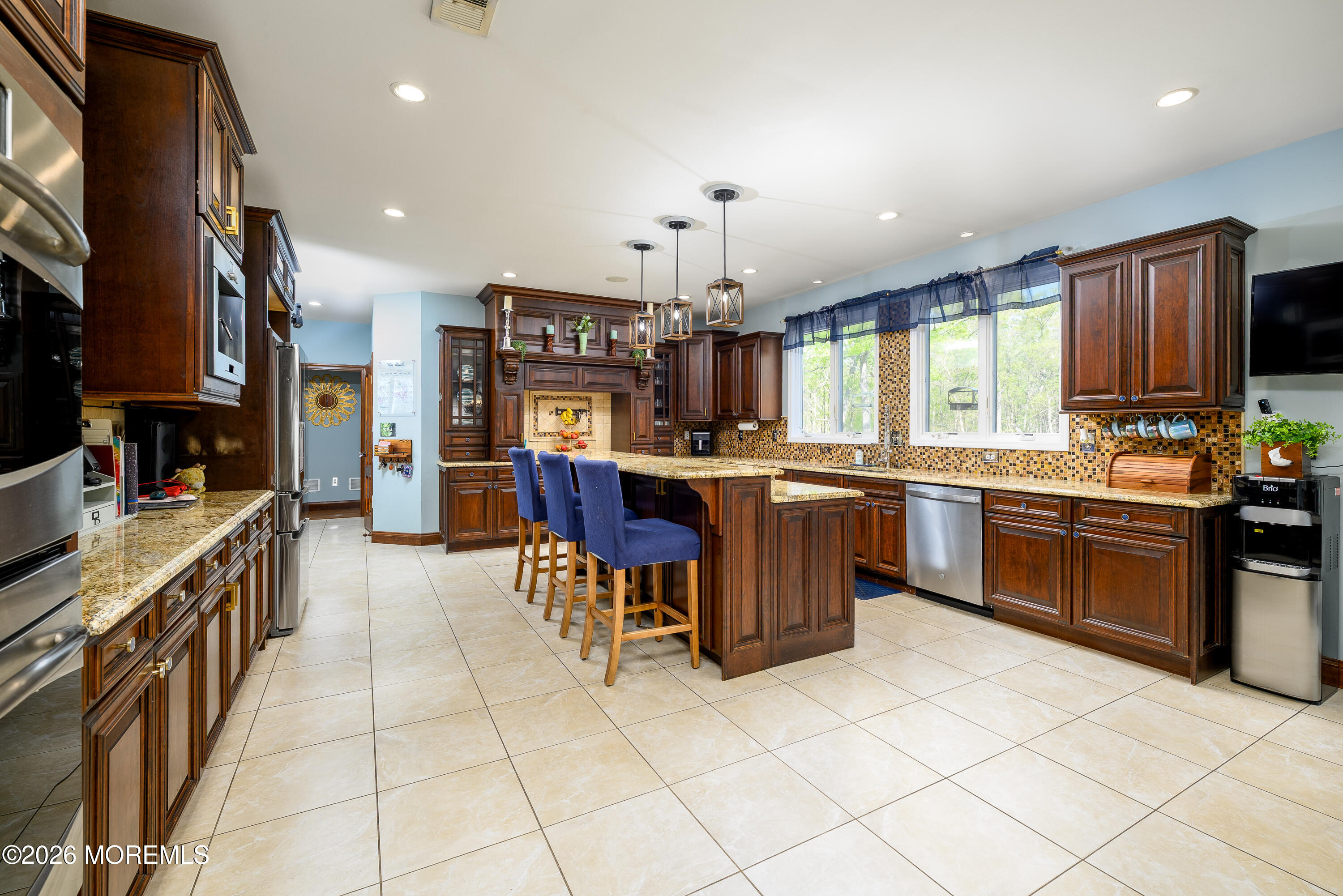 60 Partners Lane Freehold, NJ 07728 - Photo 3 of 56 a kitchen with stainless steel appliances a sink counter space cabinets and a window