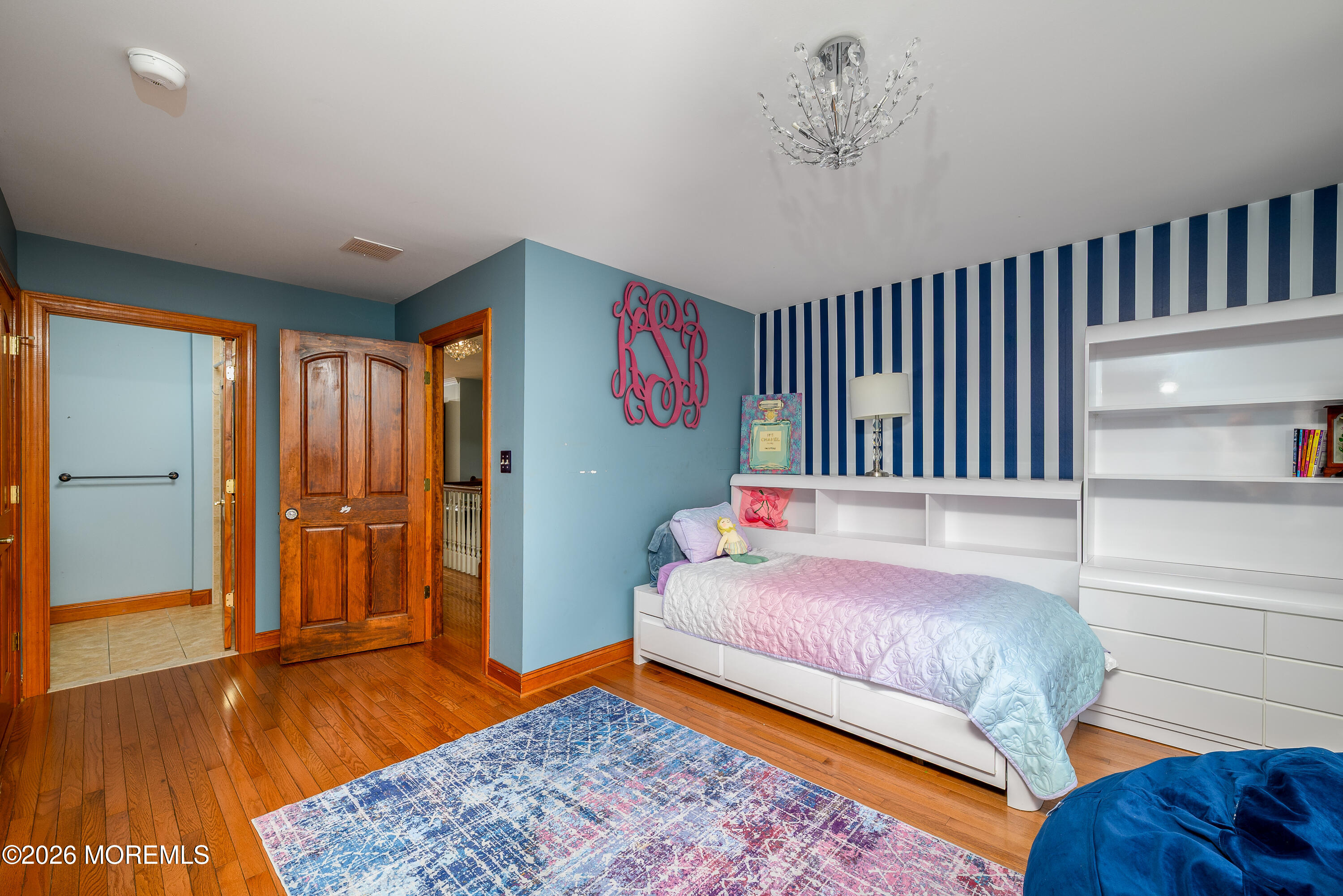 60 Partners Lane Freehold, NJ 07728 - Photo 31 of 56 a bedroom with a bed and wooden floor