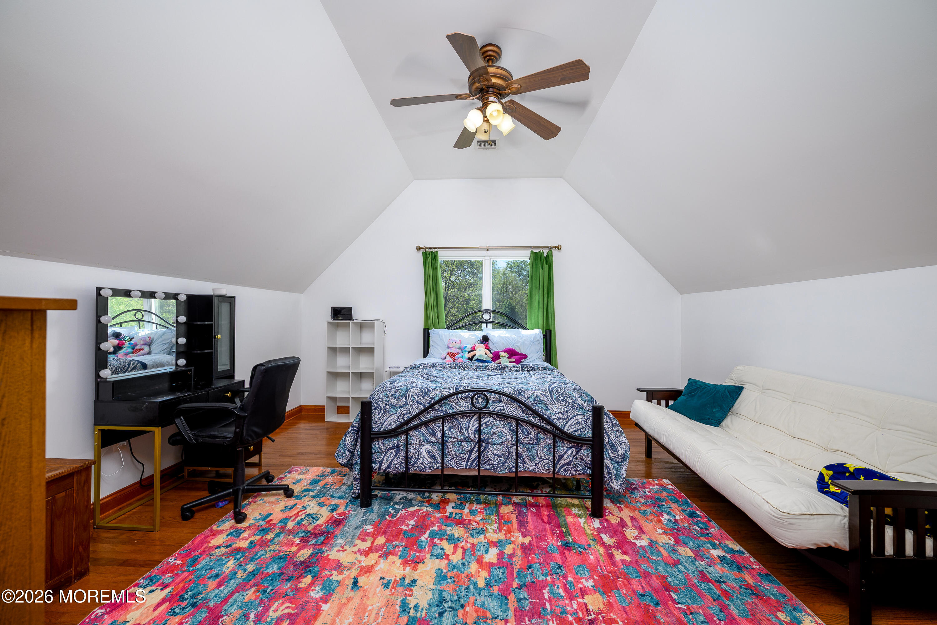 60 Partners Lane Freehold, NJ 07728 - Photo 32 of 56 a bedroom with furniture and a chandelier