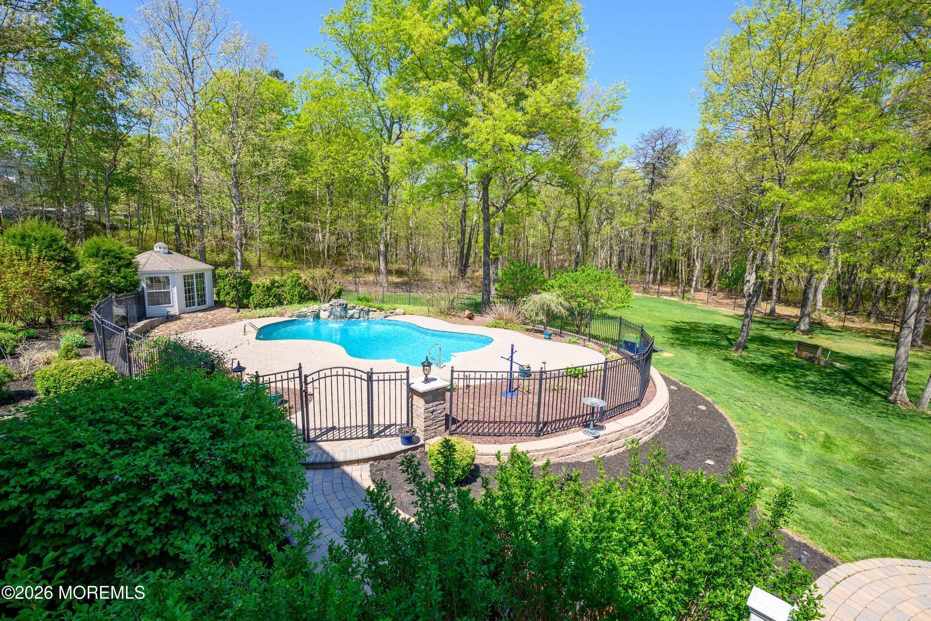 60 Partners Lane Freehold, NJ 07728 - Photo 45 of 56 a view of a backyard with swimming pool