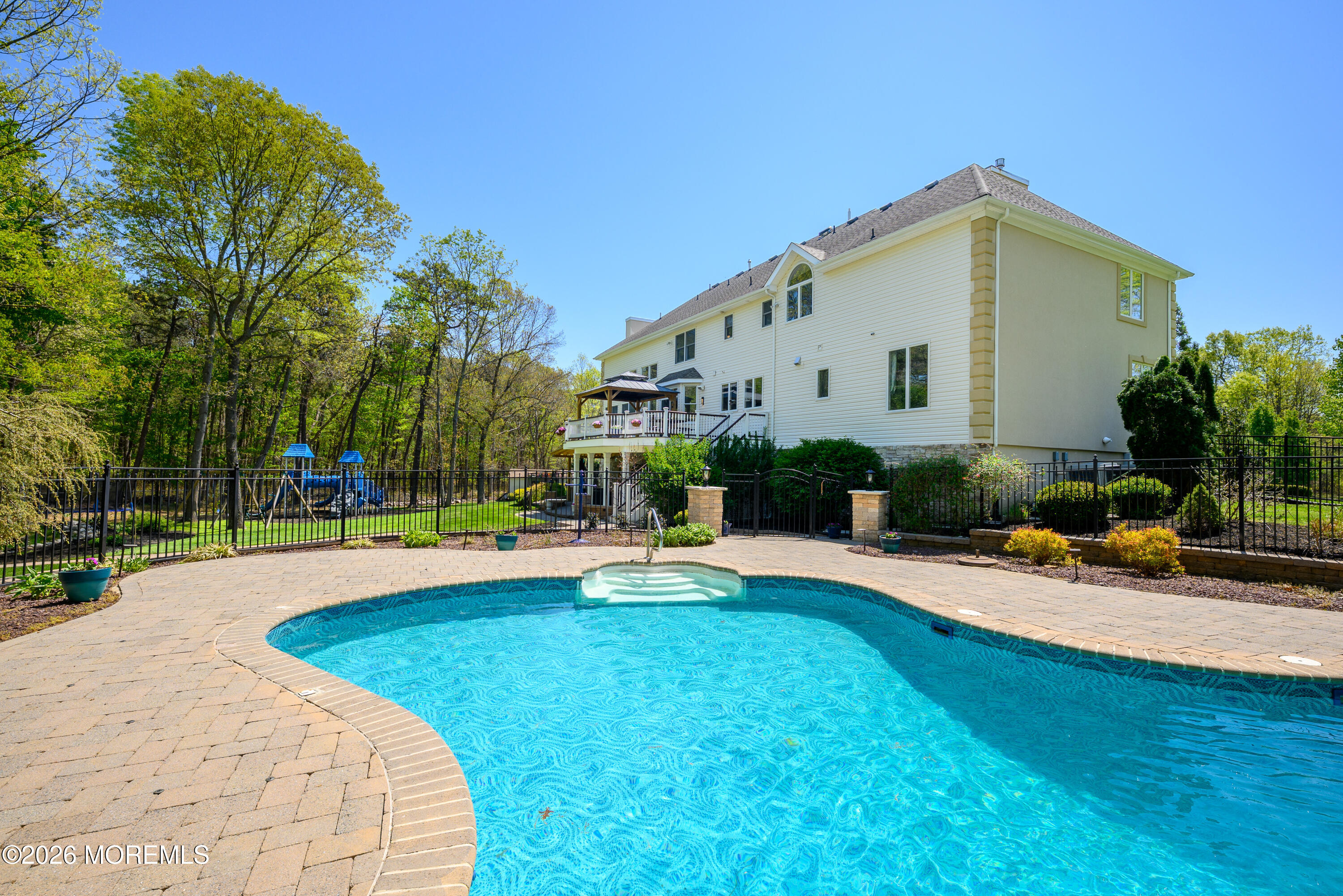60 Partners Lane Freehold, NJ 07728 - Photo 47 of 56 a view of a house with swimming pool and sitting area