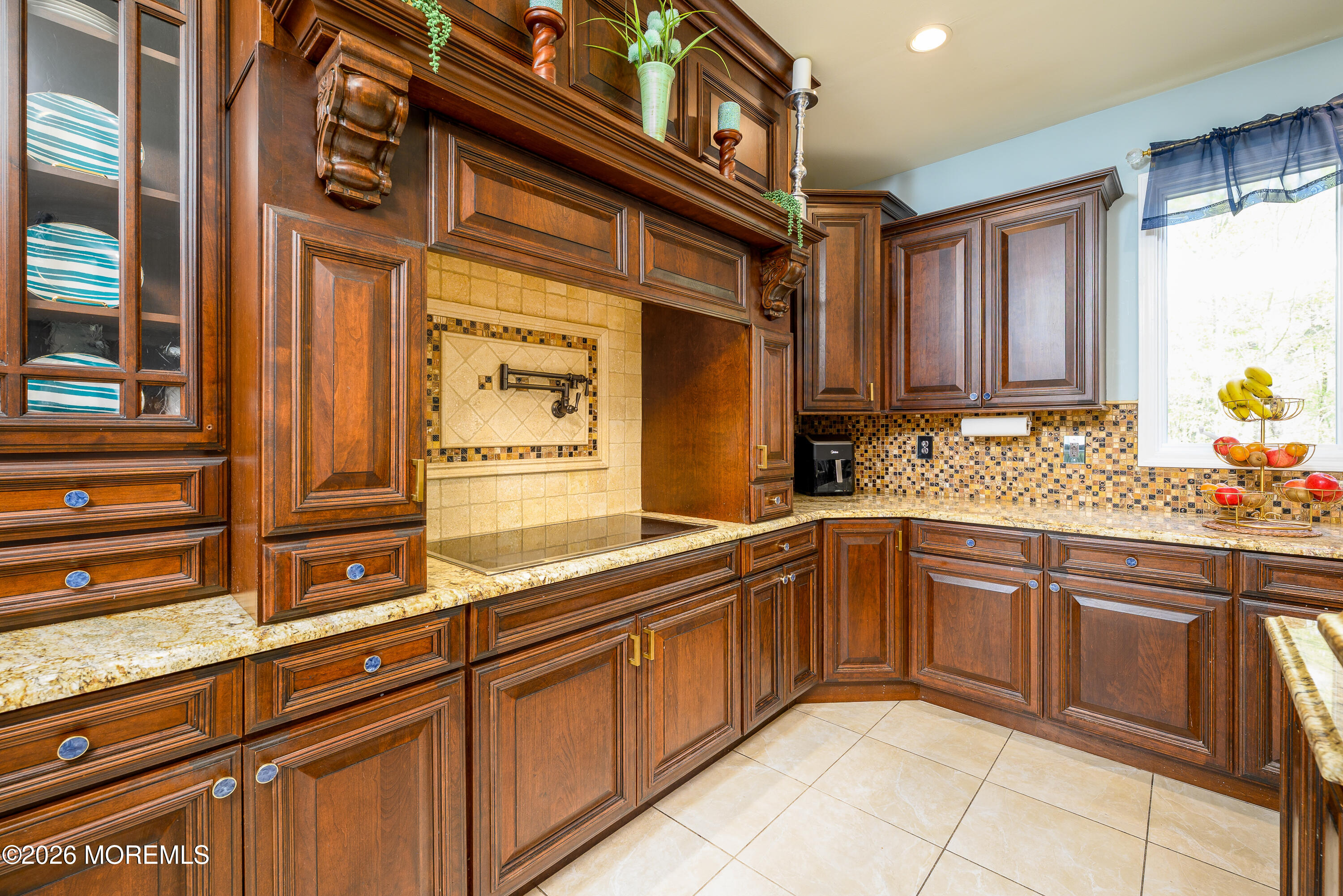 60 Partners Lane Freehold, NJ 07728 - Photo 5 of 56 a kitchen with cabinets and large window