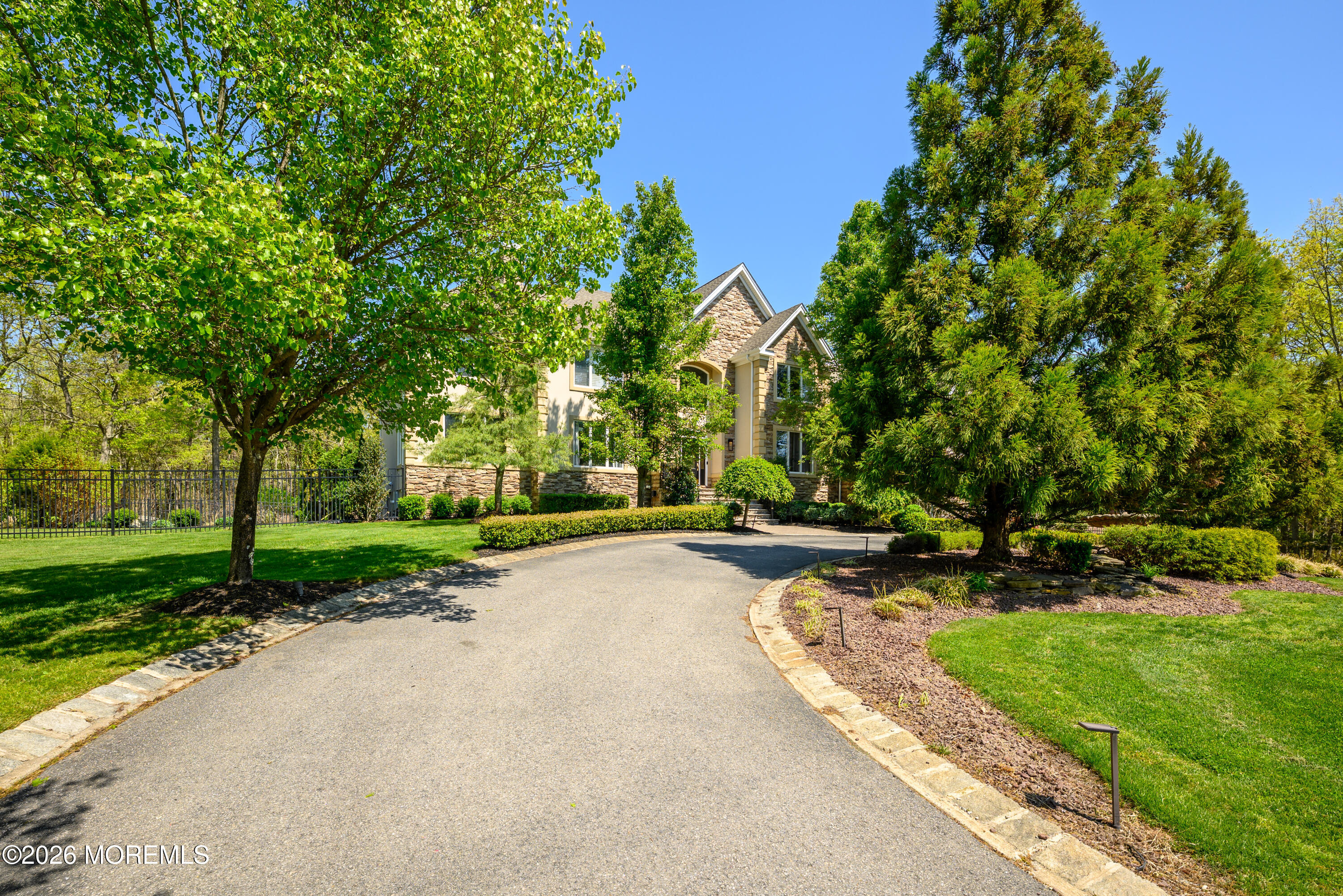 60 Partners Lane Freehold, NJ 07728 - Photo 56 of 56 a view of a street with a building and a street sign
