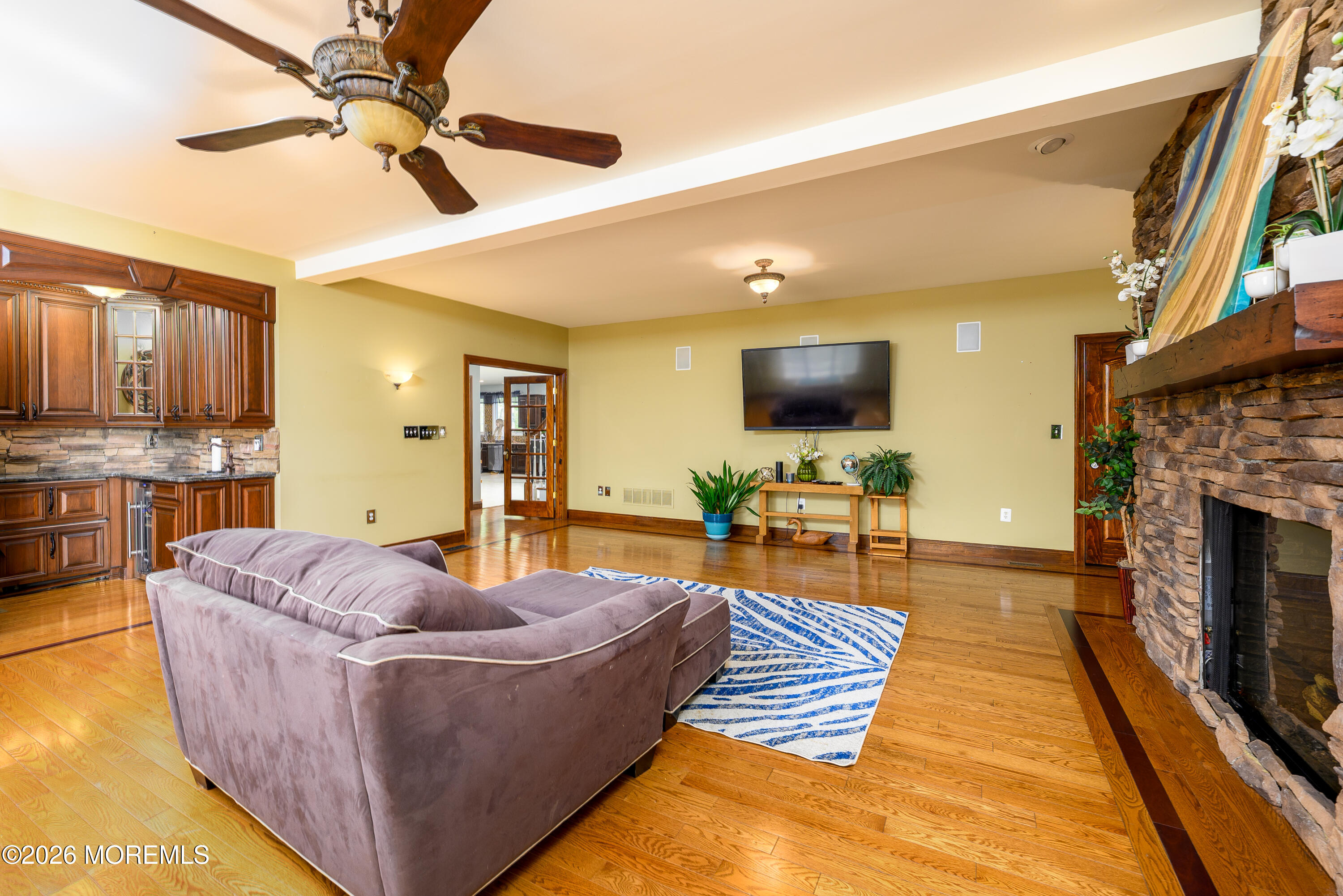 60 Partners Lane Freehold, NJ 07728 - Photo 10 of 56 a living room with furniture and a flat screen tv
