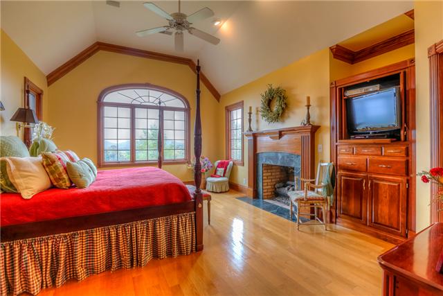 4403 Arno Road Franklin, TN 37064 - Photo 17 of 20 Master Bedroom with fireplace & built-in cabinets. Separate Her bathroom with bay window & walk-in closet. His bathroom is on the opposite side with separate closet.