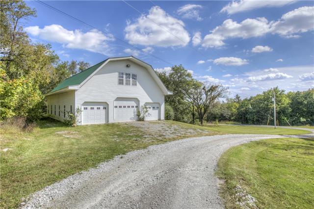 4403 Arno Road Franklin, TN 37064 - Photo 3 of 20 60x40 Barn/Shop with 4 garage doors. 3 in front and one in back. Great event space or just storage for your 4-wheelers, antique tractor or 4 legged friends.