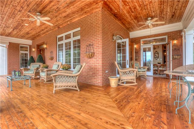 4403 Arno Road Franklin, TN 37064 - Photo 8 of 20 Wrap around front & side covered porch with tongue & grove red cedar. 2 sets of French Doors - dining rm and breakfast rm.